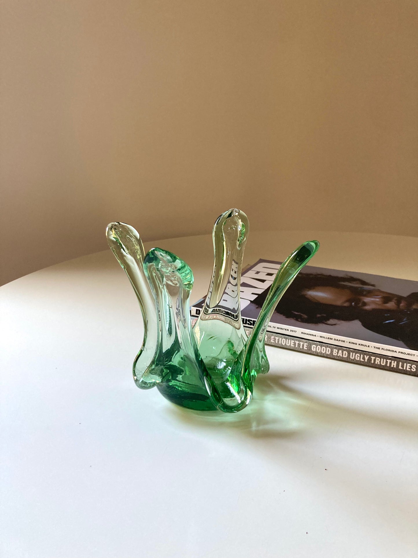 Green glass candle holder centrepiece