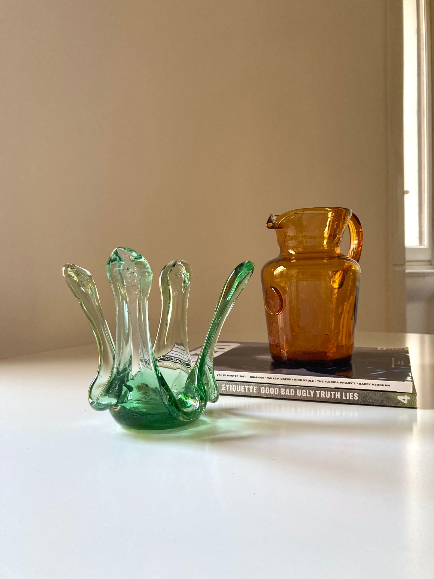Green glass candle holder centrepiece