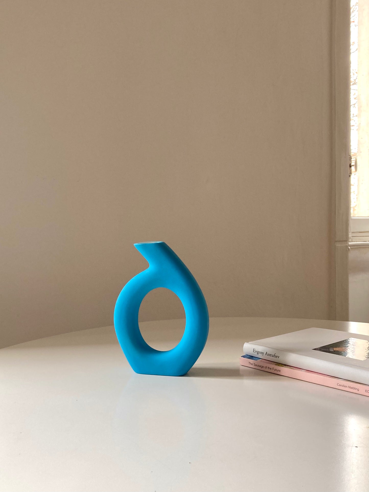 Light blue ceramic vase