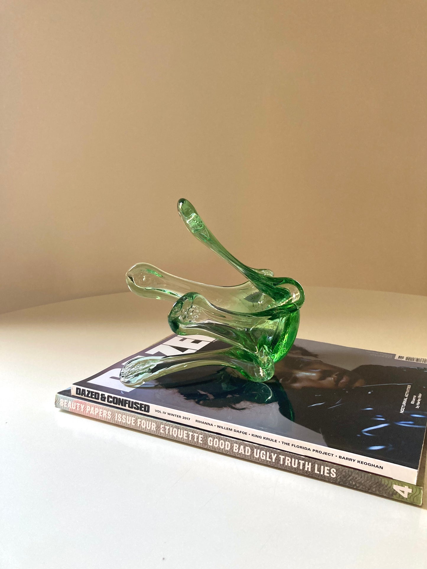 Green glass candle holder centrepiece