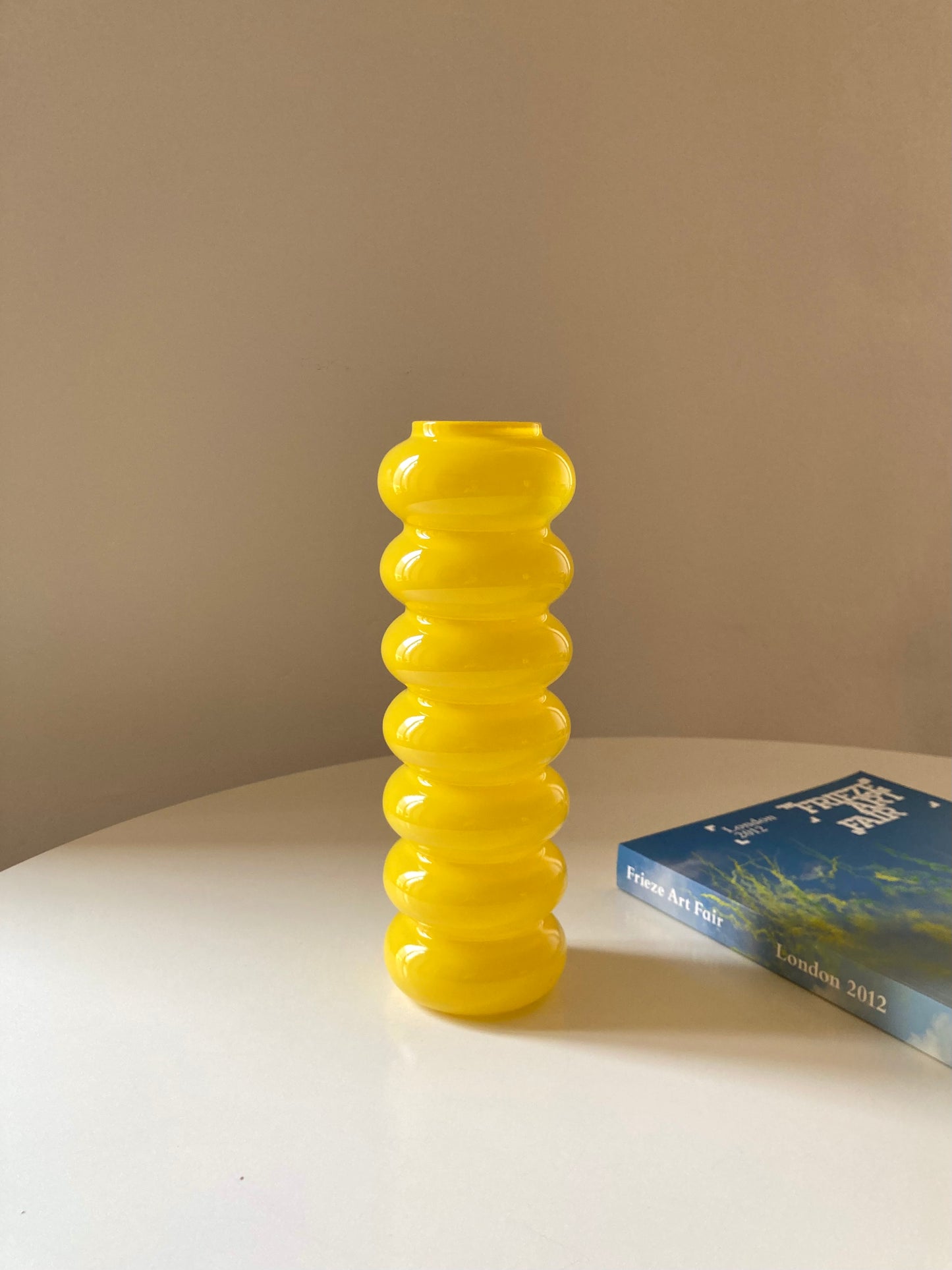 Solstrale yellow vase by Anne Nilsson