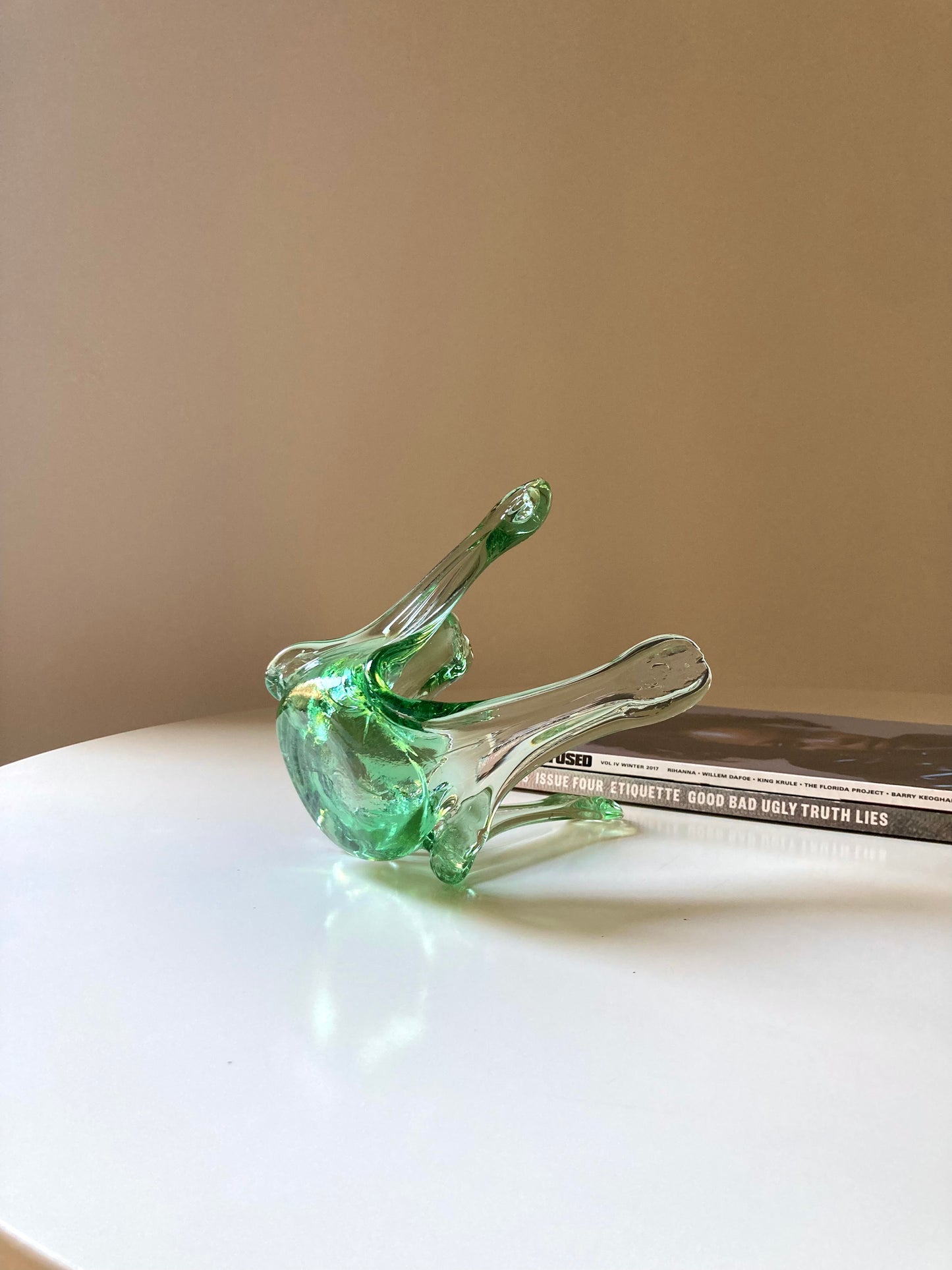 Green glass candle holder centrepiece