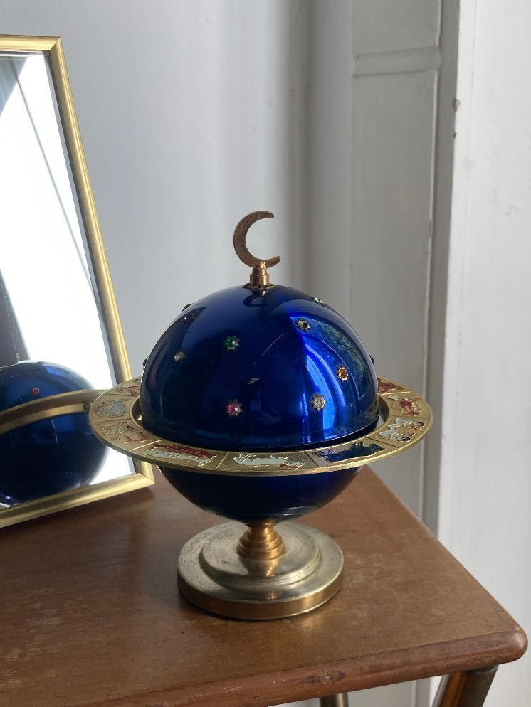 Portasigarette a pianeta blu con zodiaco