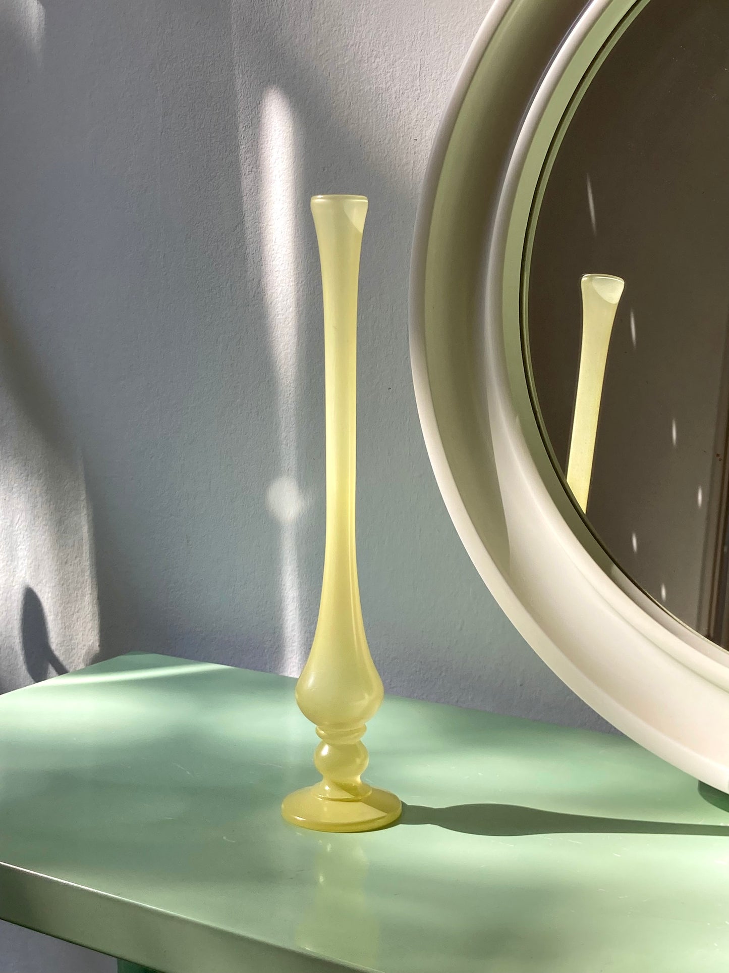 Single flower vase in yellow glass