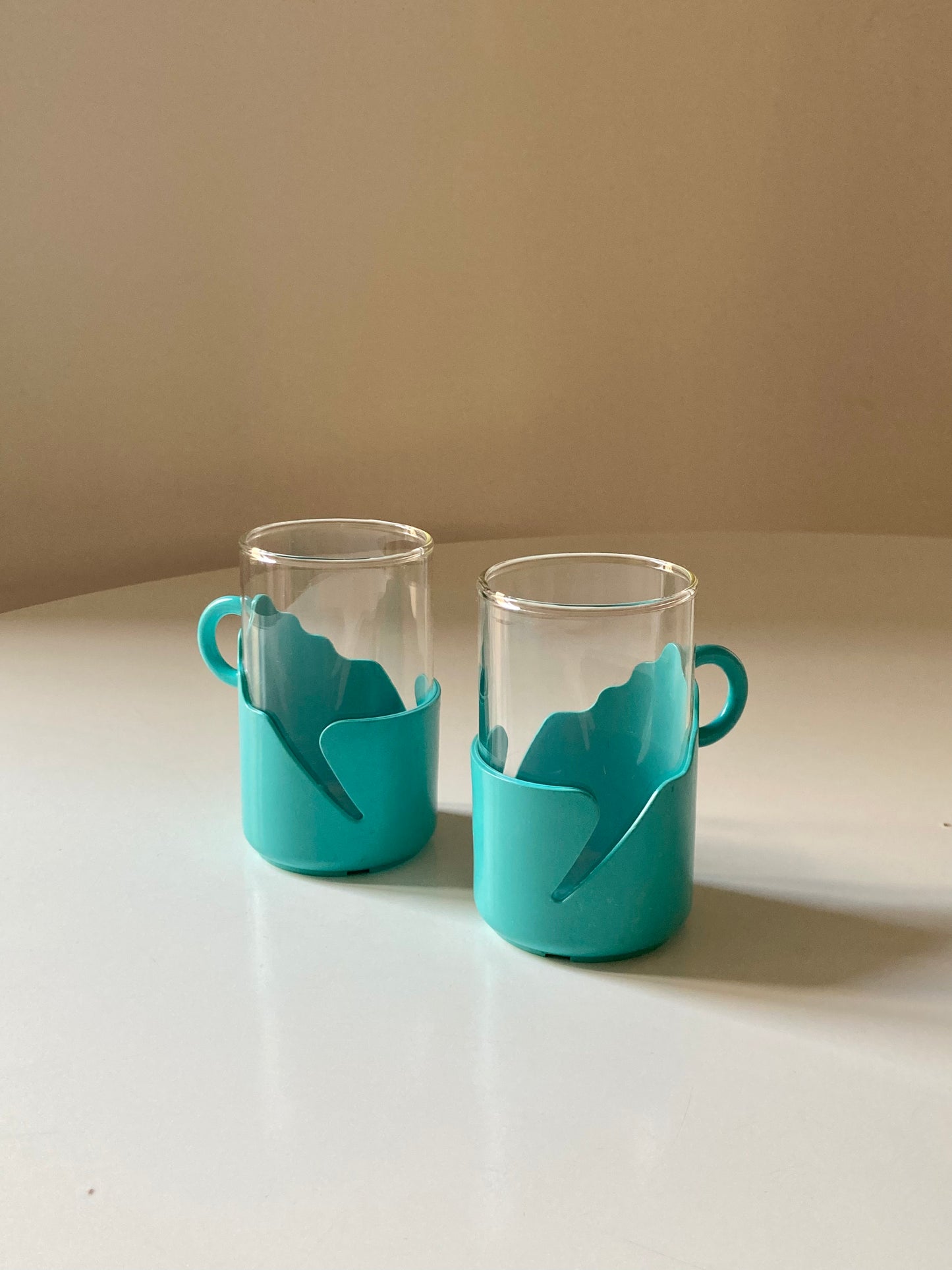 Pair of turquoise space age cups