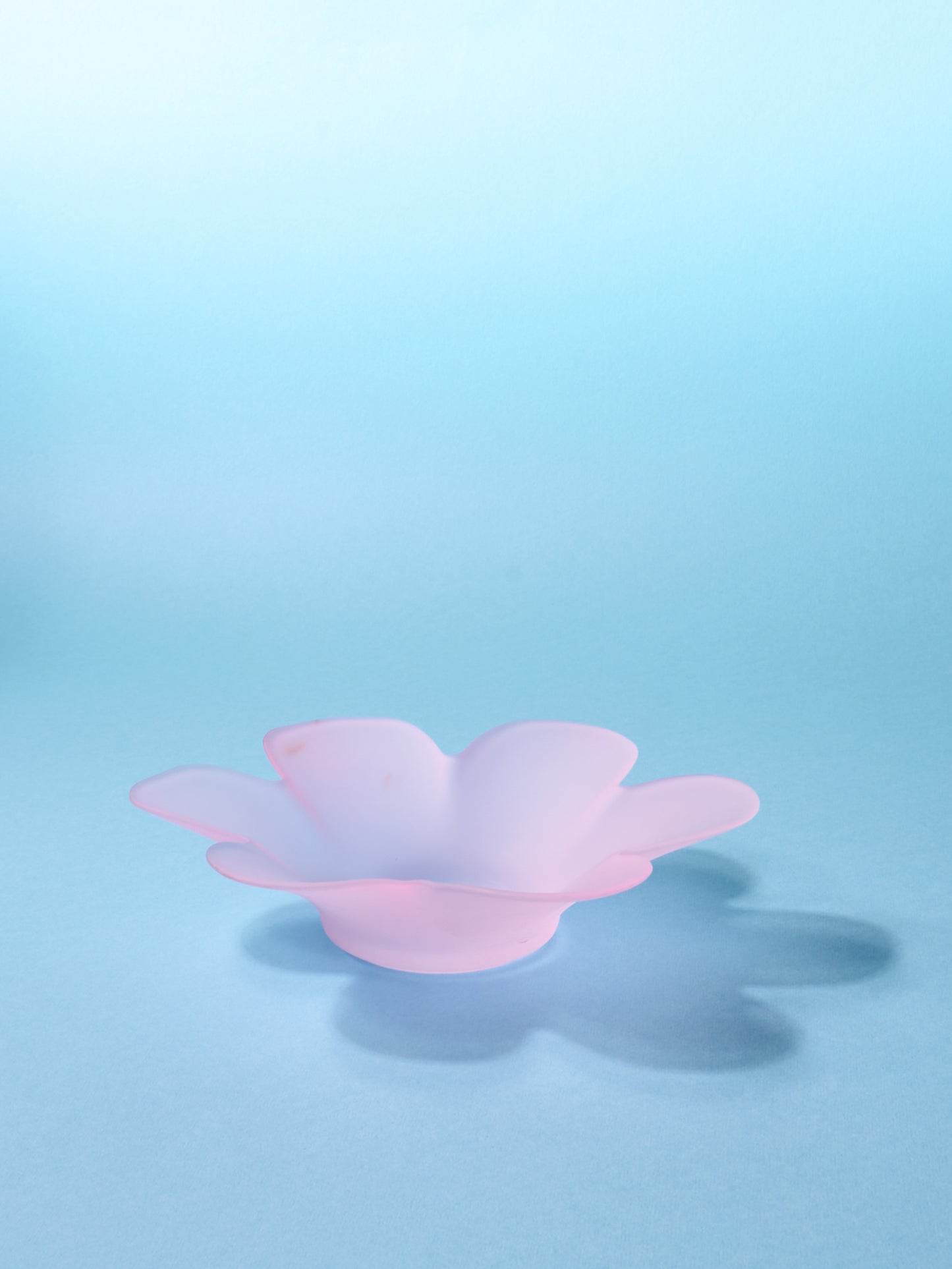 Pink glass flower-shaped bowls