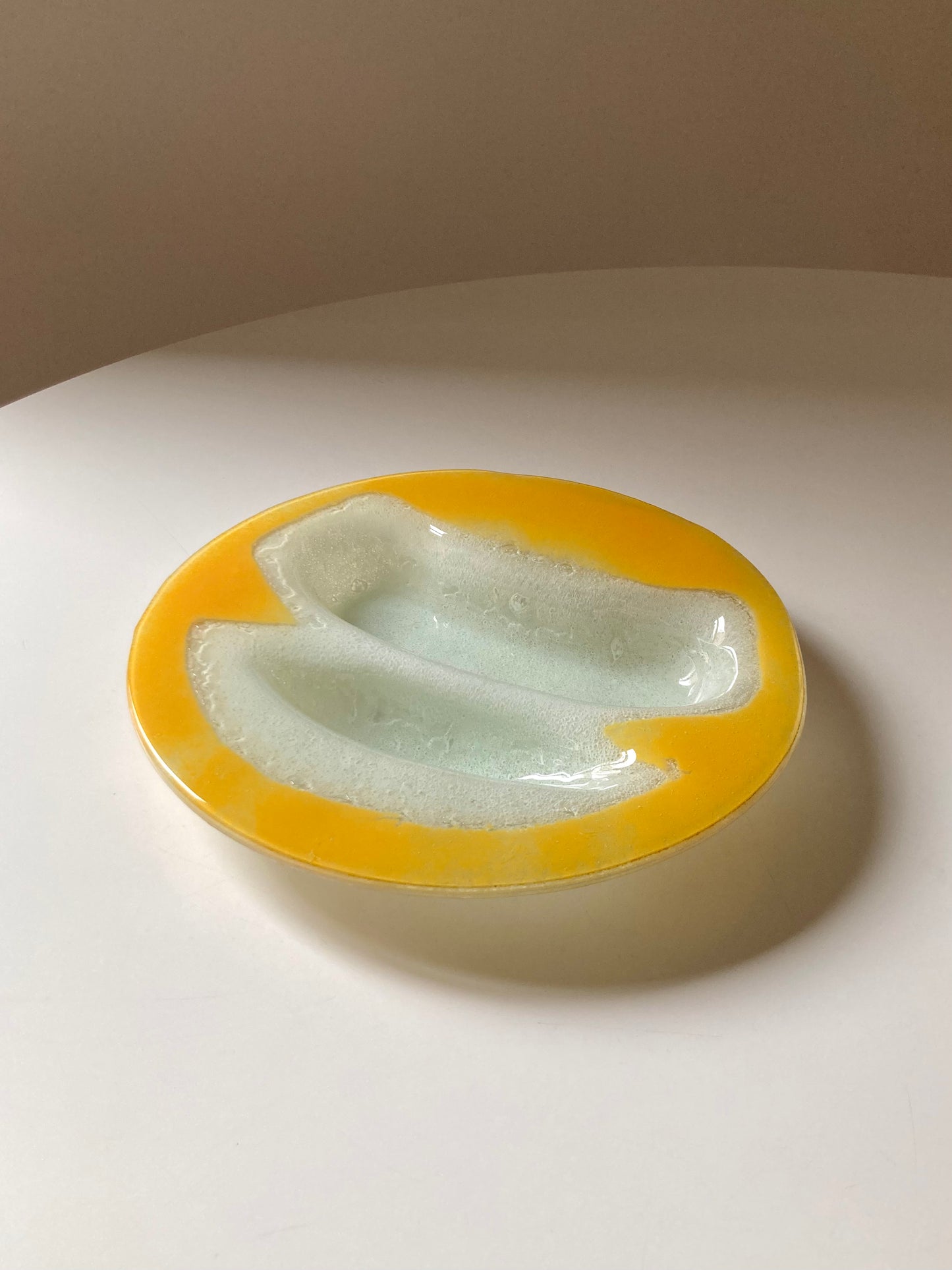 Yellow and white glass plate