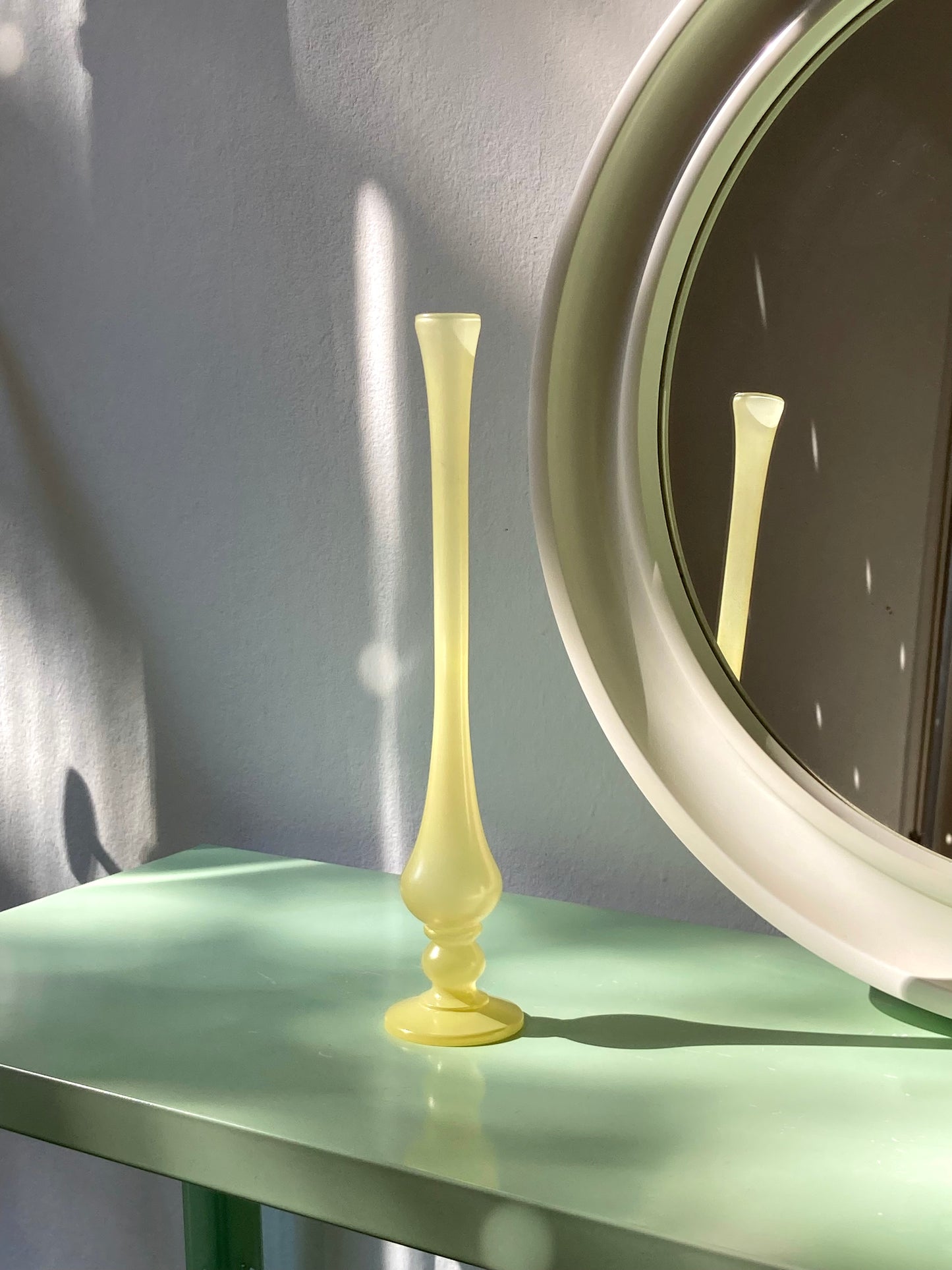 Single flower vase in yellow glass