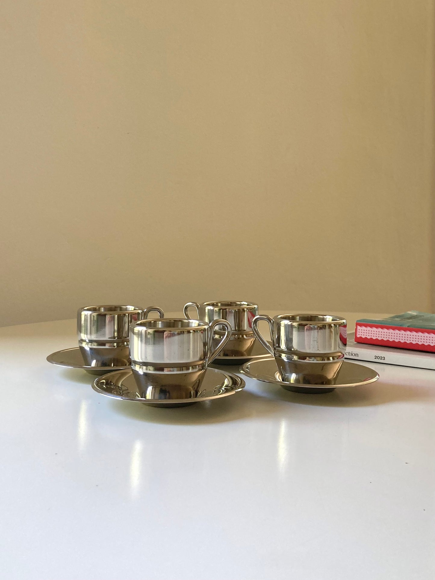 Set of 4 steel cups and sugar bowl