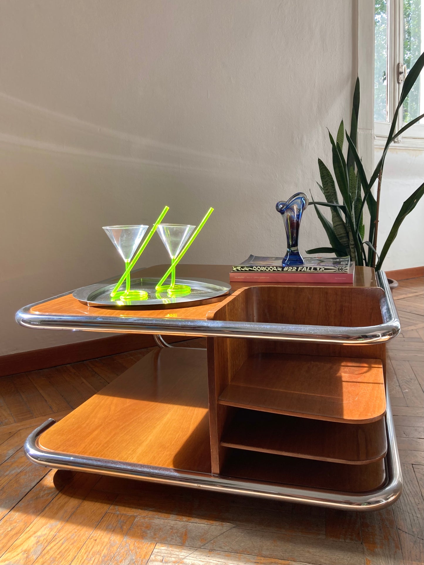 Square wooden coffee table with chromed profile