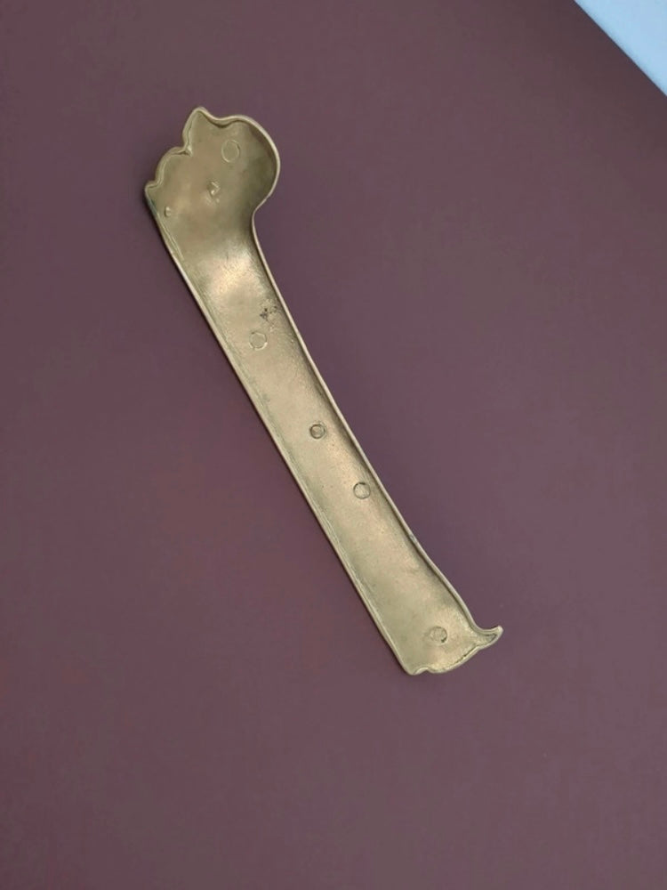 Righello bassotto vintage in ottone