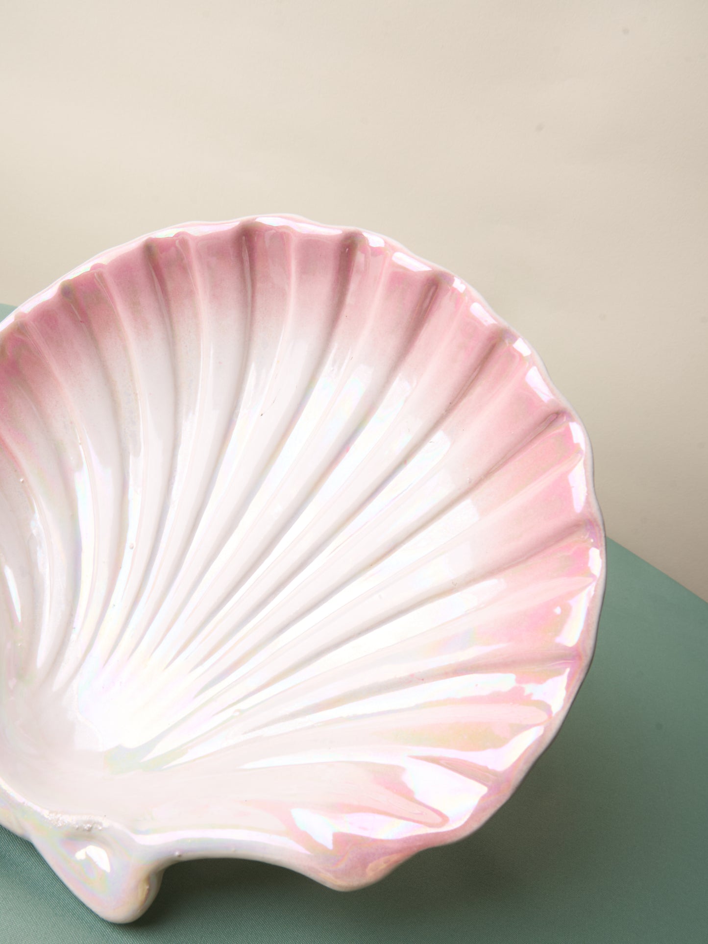 Pink and white ceramic shell plate