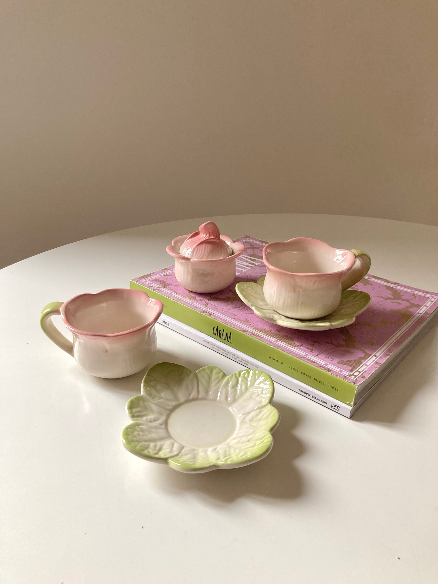 Pair of teacups with sugar bowl