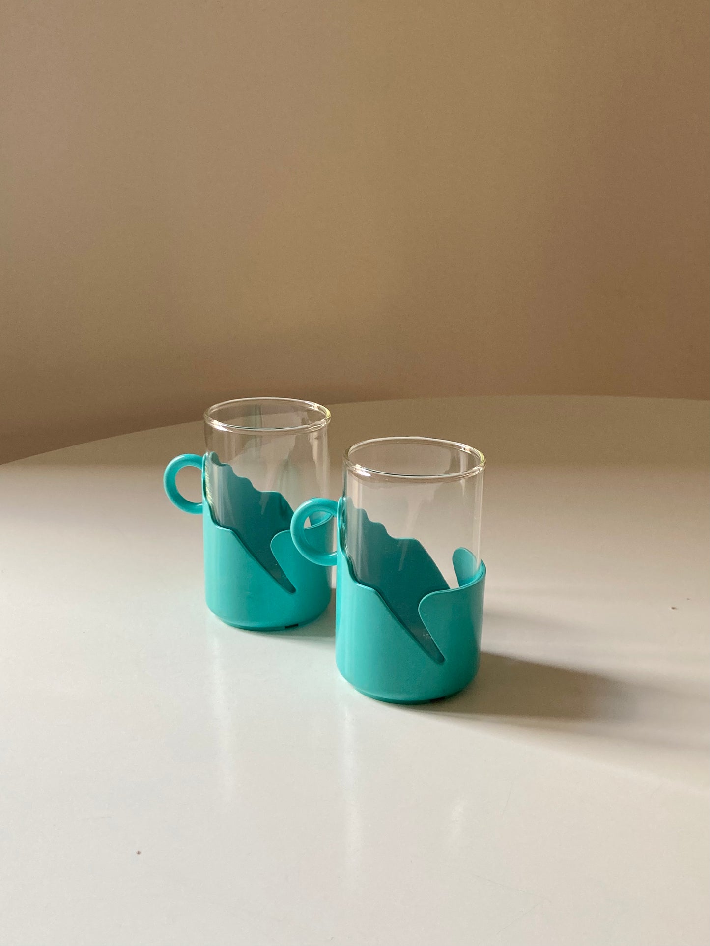 Pair of turquoise space age cups