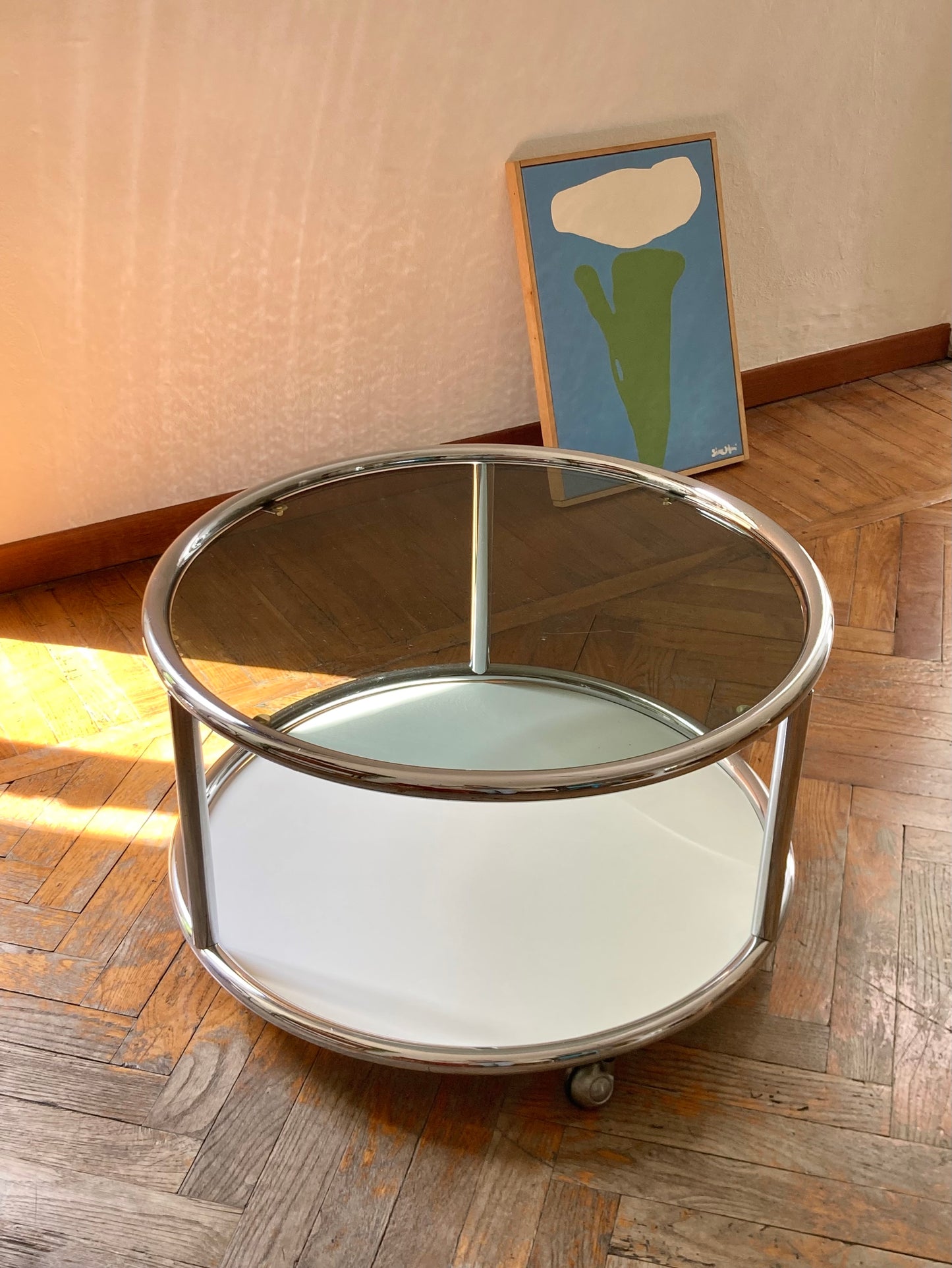 Vintage round coffee table with chrome profiles