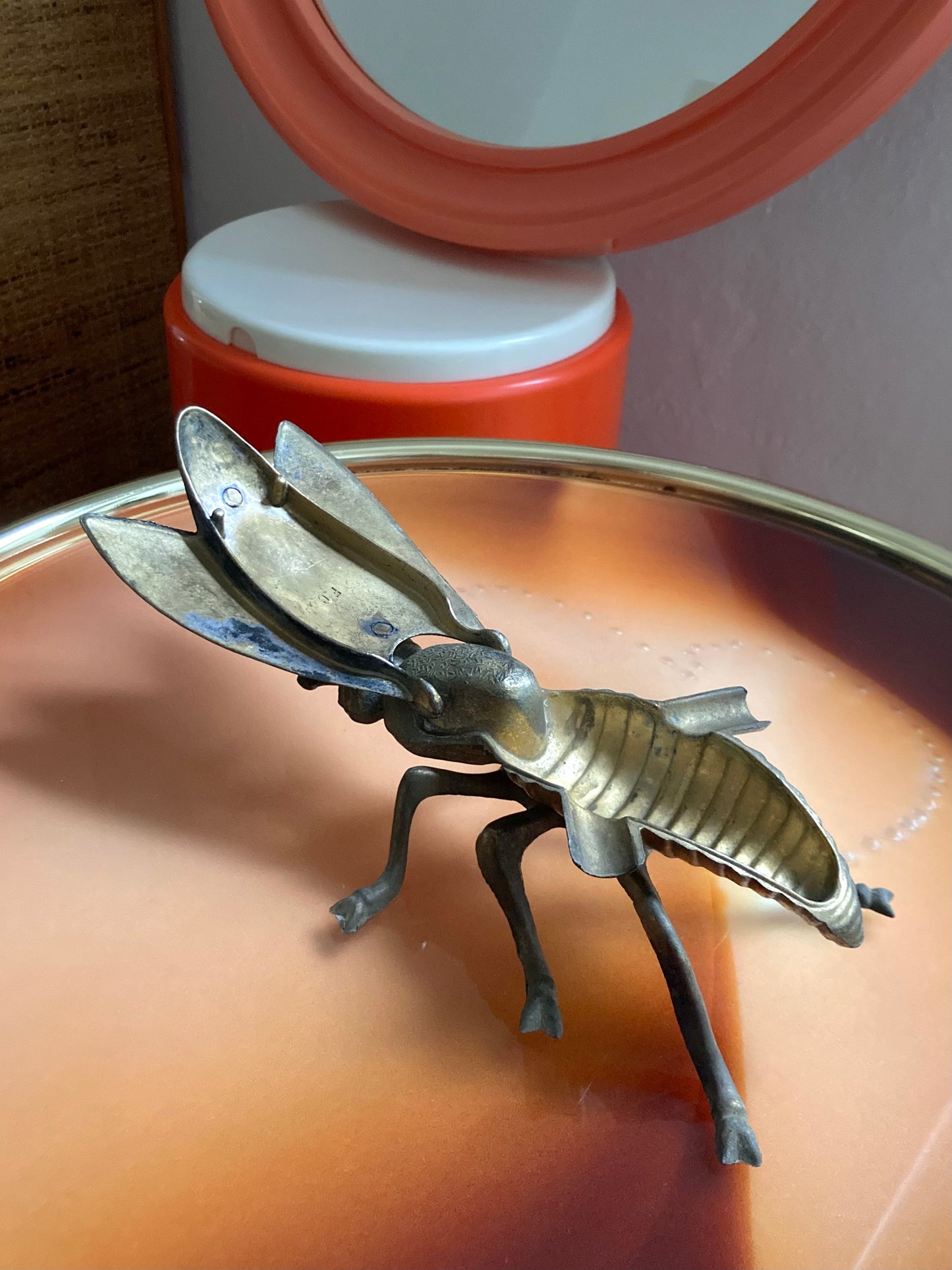 1950s insect ashtray in brass