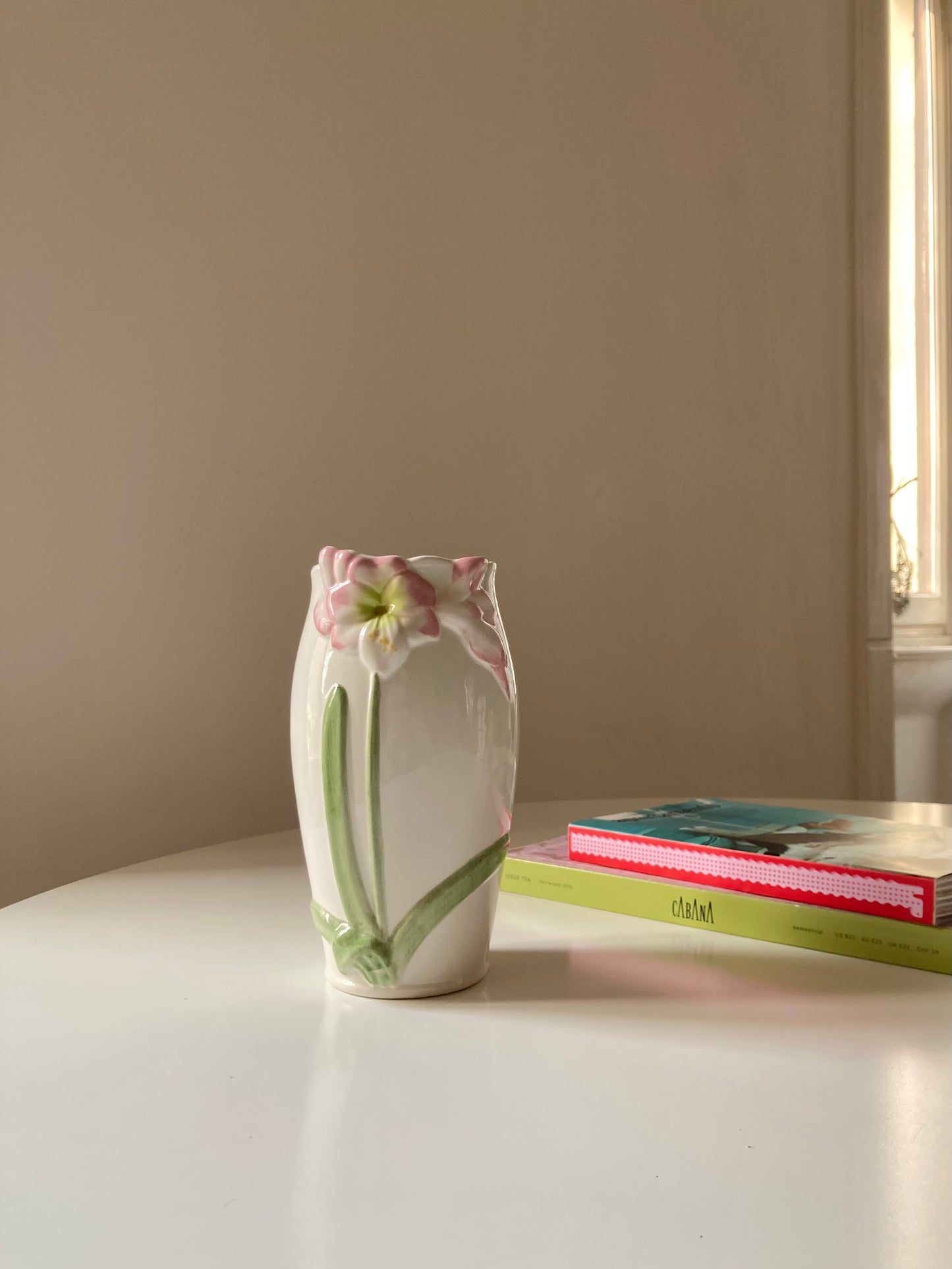 Ceramic vase with pink flowers