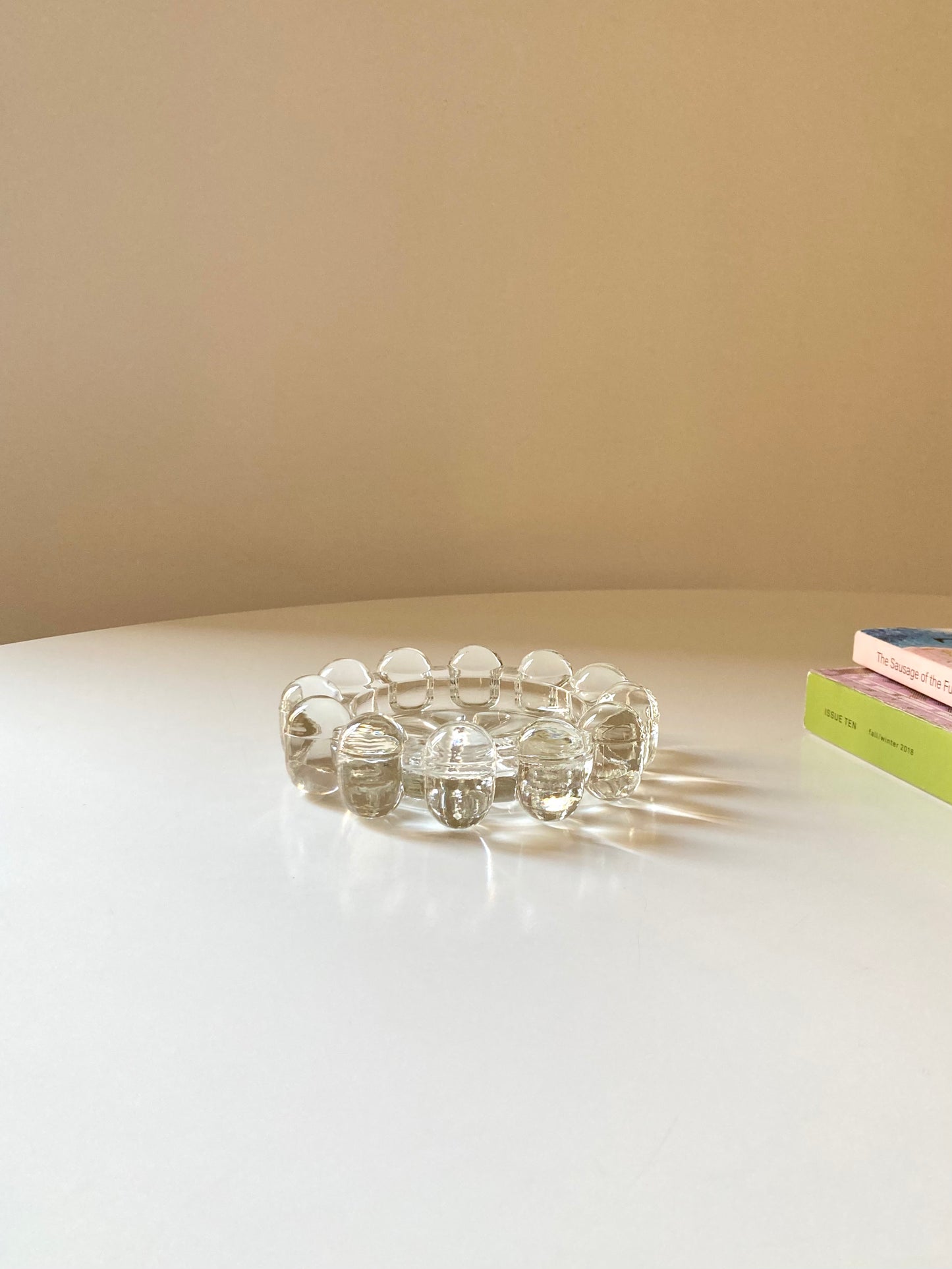 Transparent glass saucer