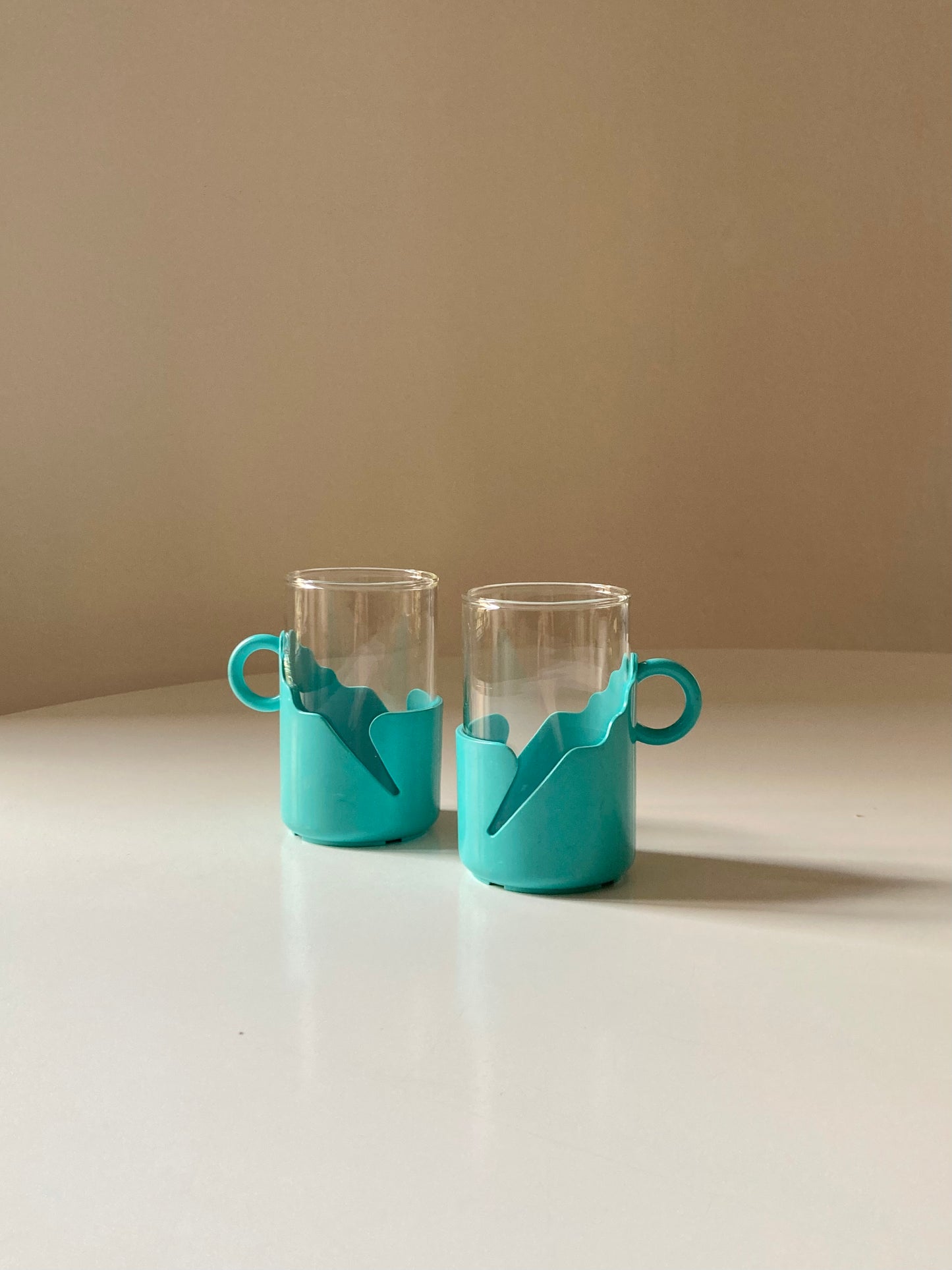 Pair of turquoise space age cups