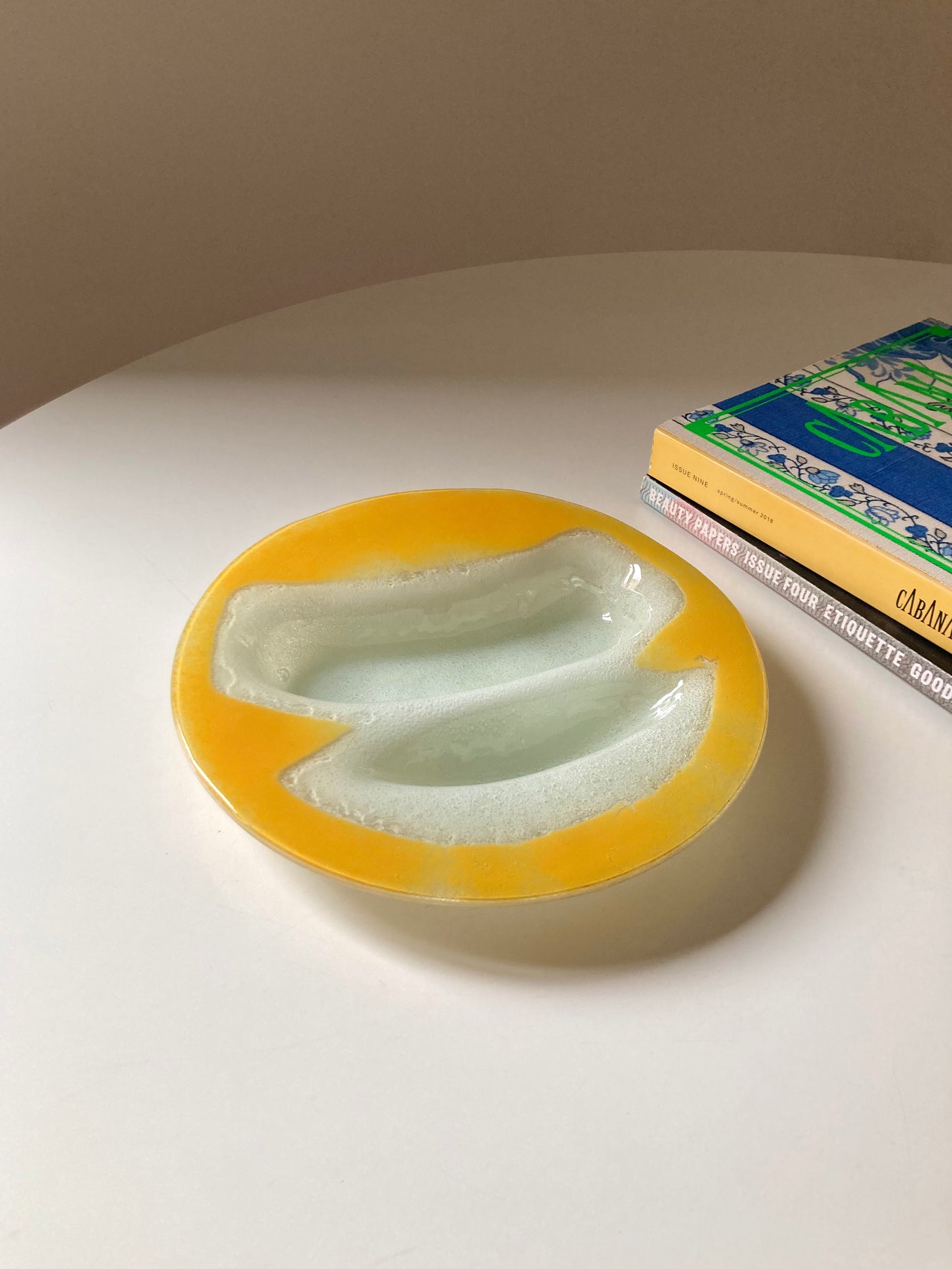 Yellow and white glass plate