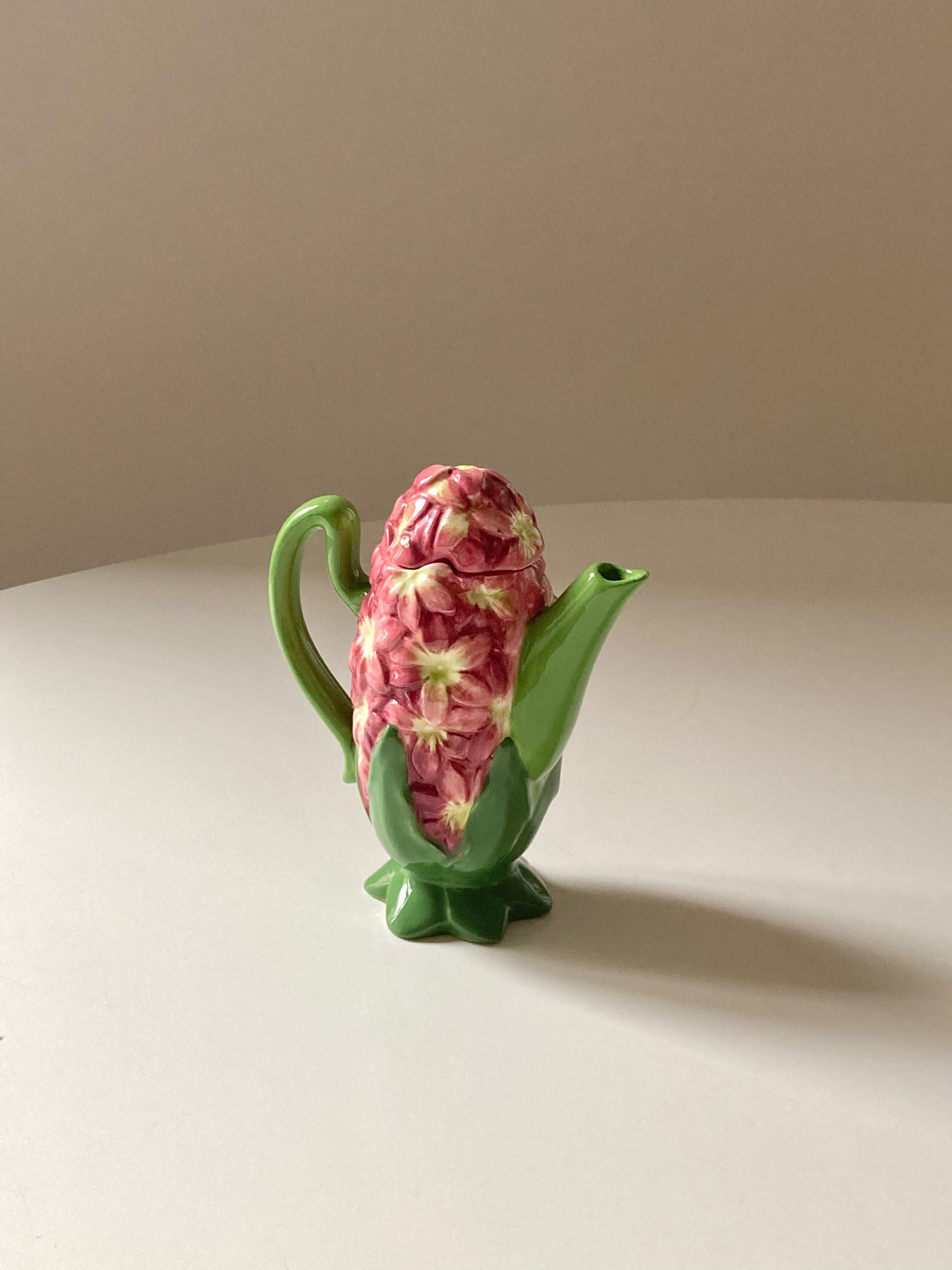 Small flower-shaped teapot