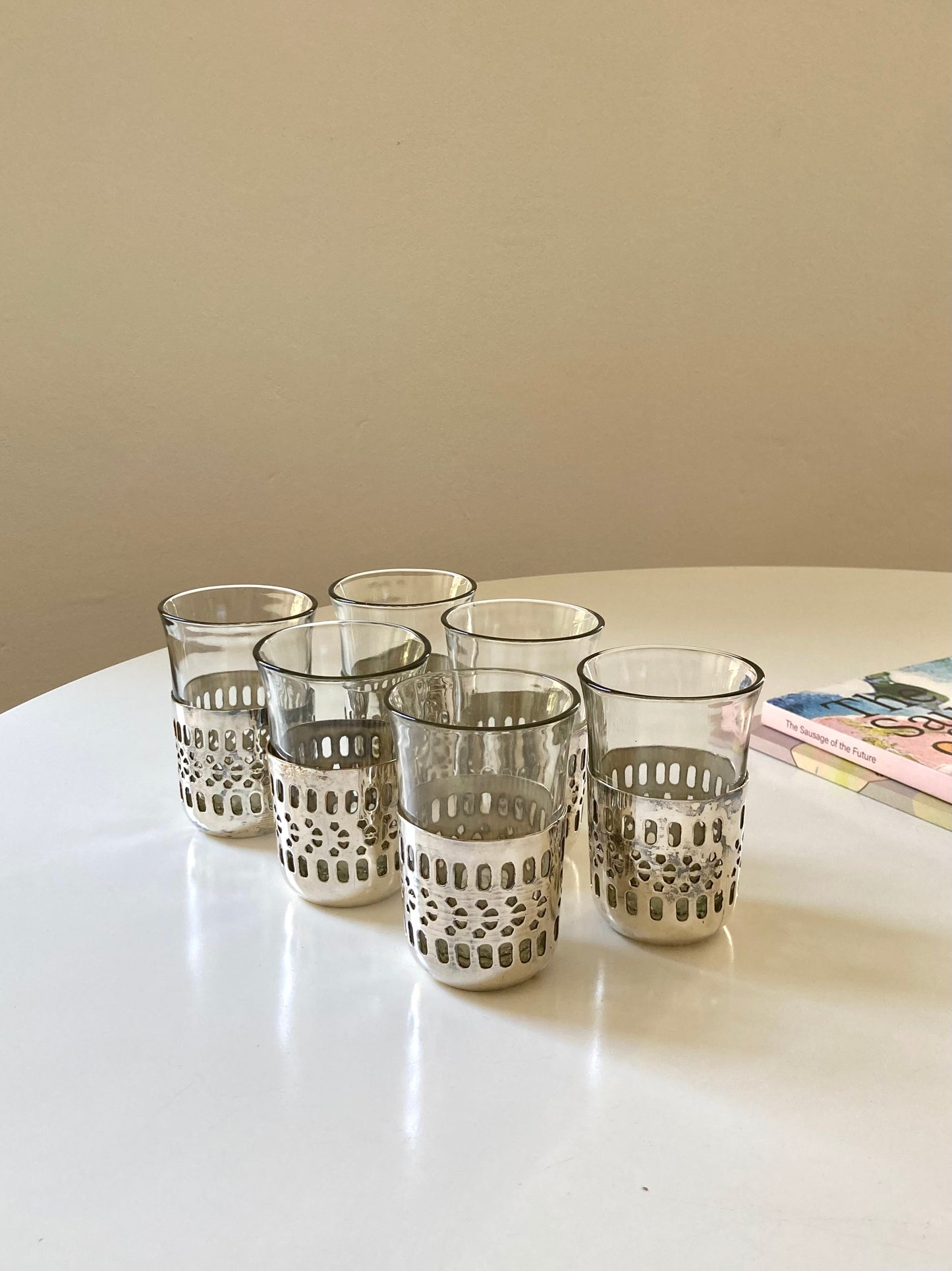 Set of glasses with metal base