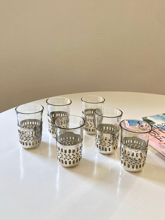 Set of glasses with metal base