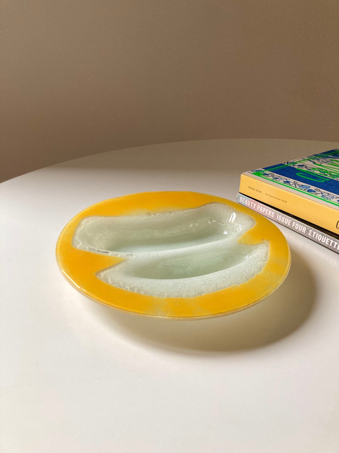 Yellow and white glass plate