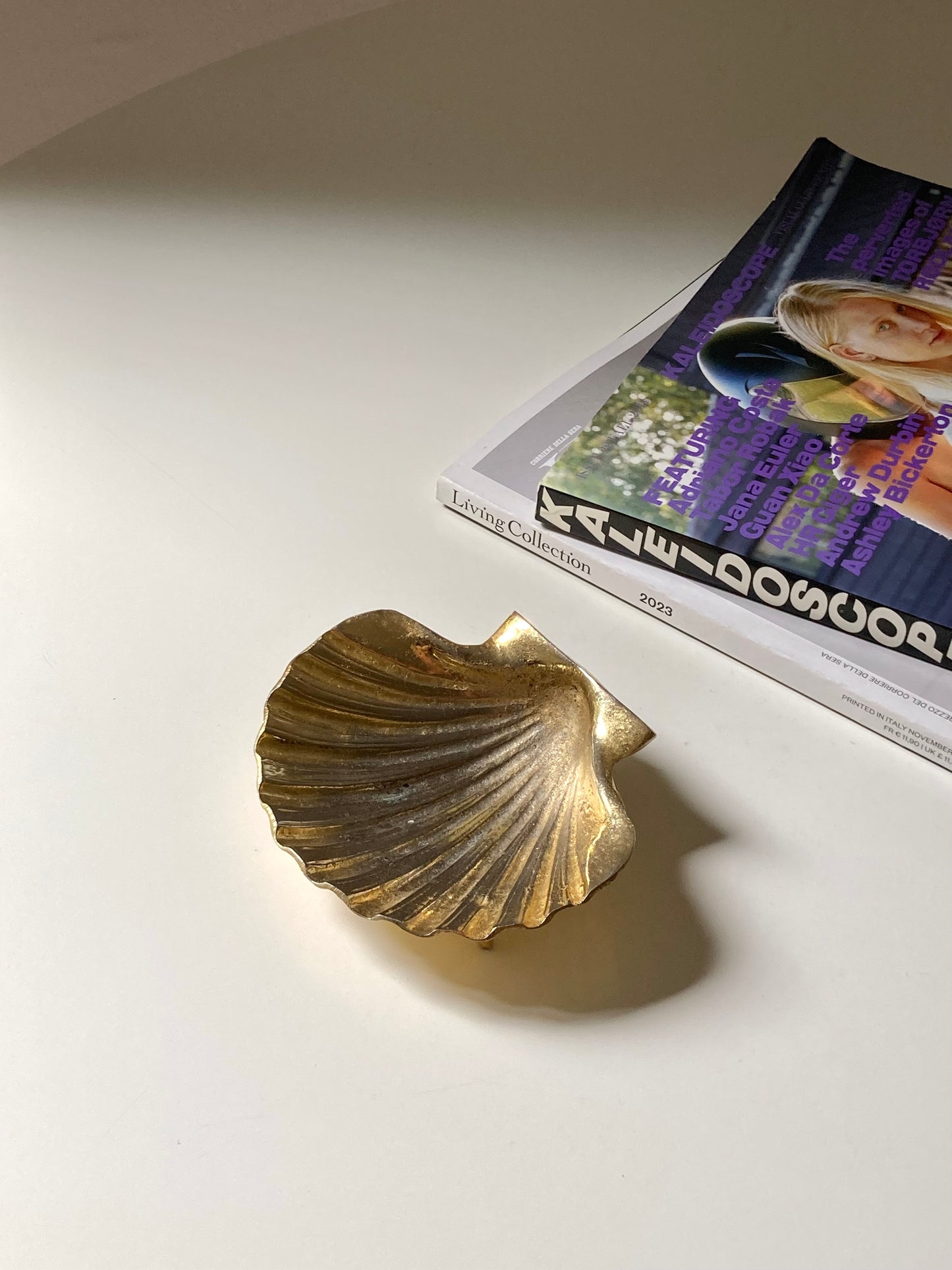 Golden shell-shaped ashtray