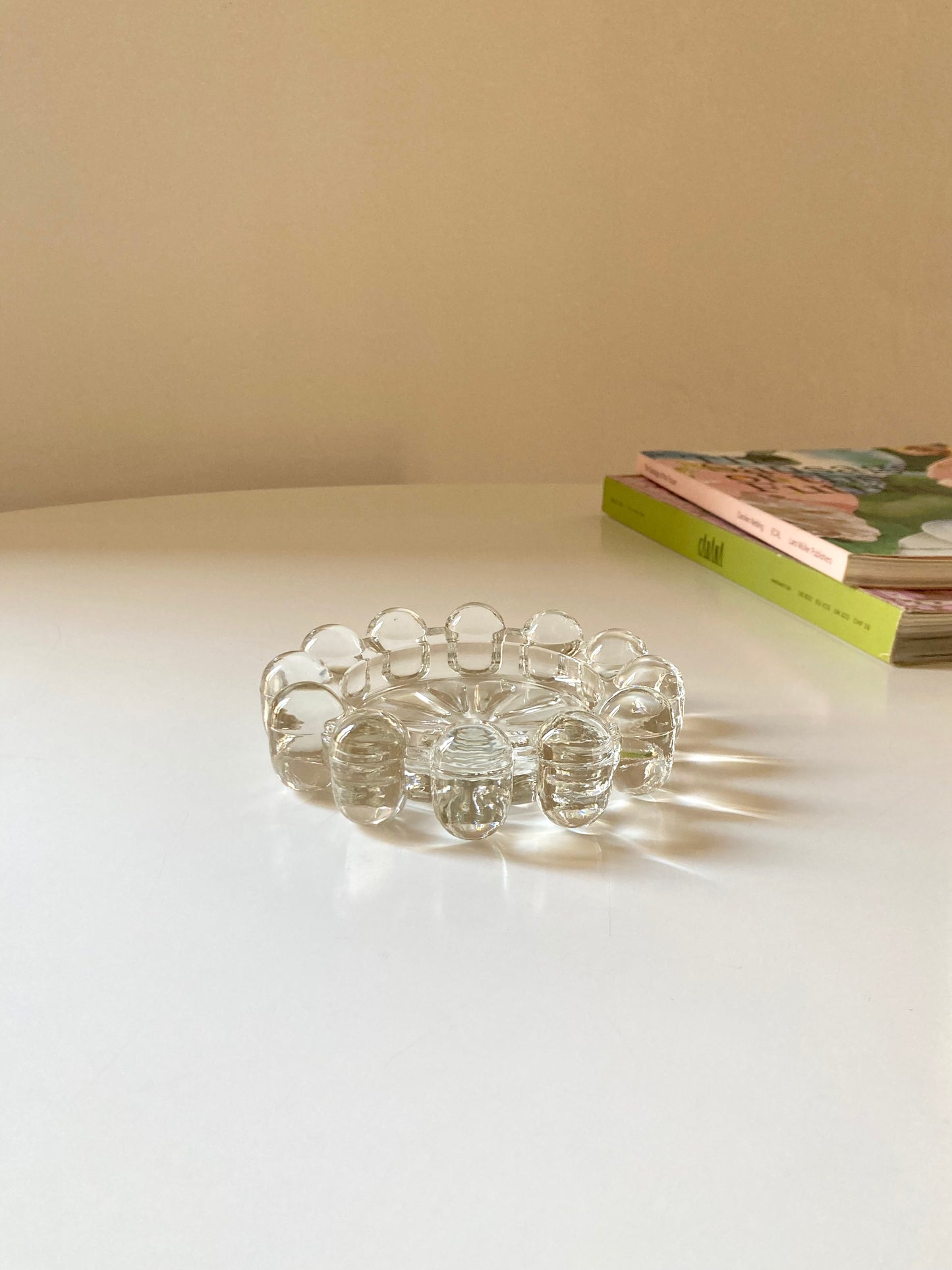 Transparent glass saucer