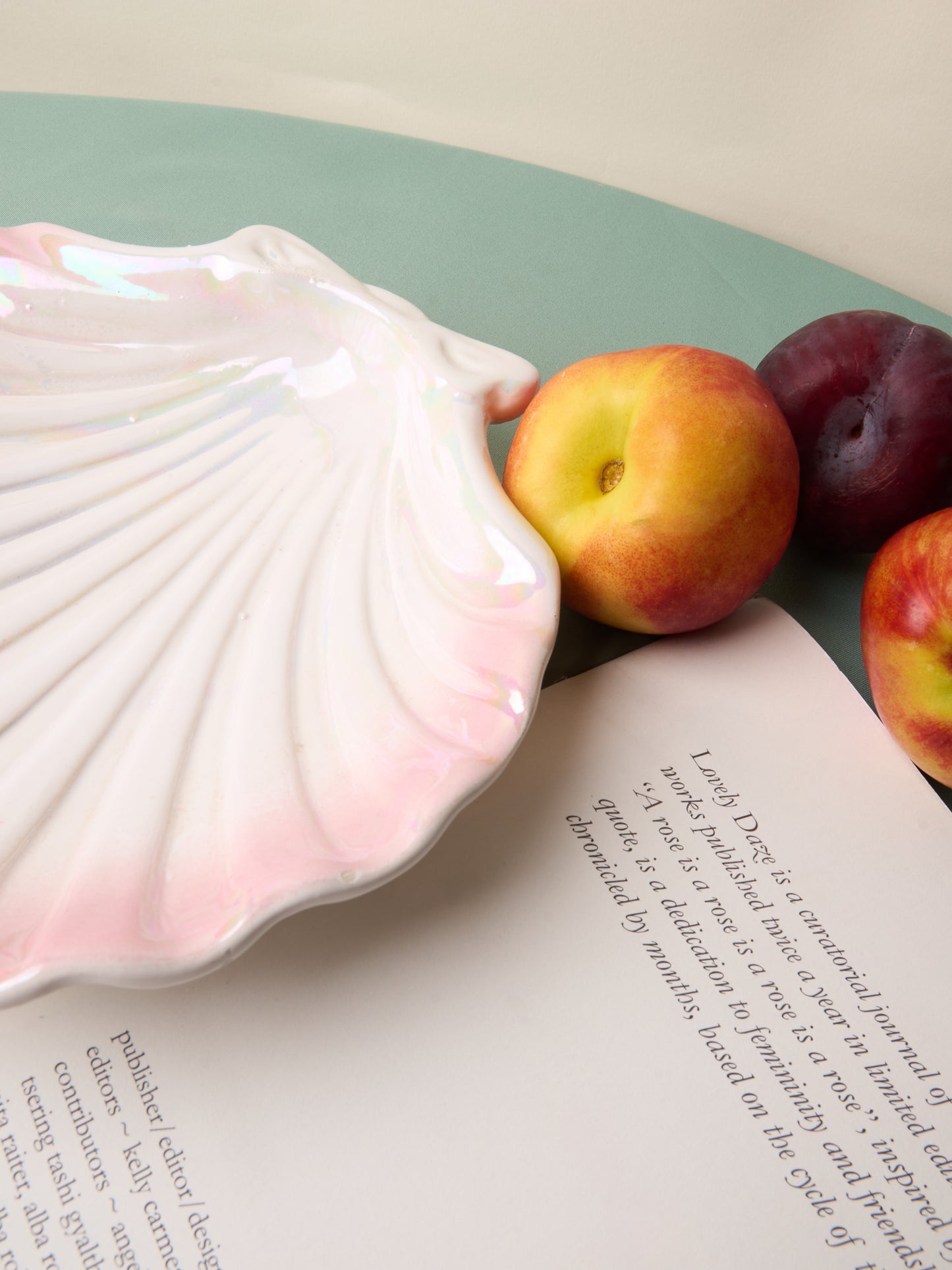 Pink and white ceramic shell plate