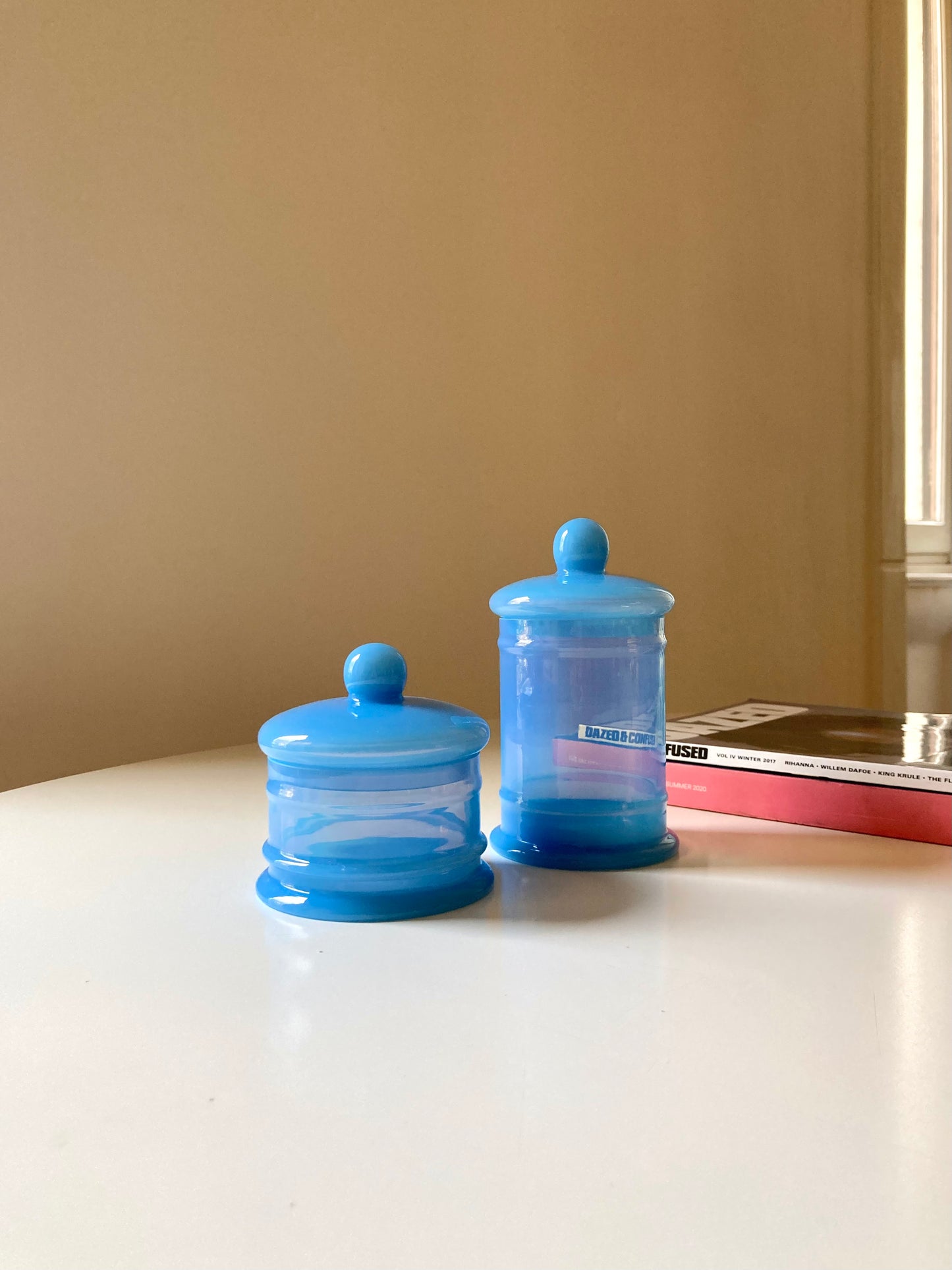 Pair of vintage light blue opaline glass jars