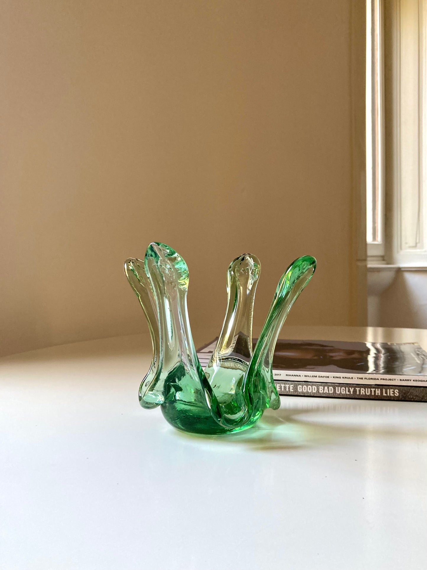 Green glass candle holder centrepiece 