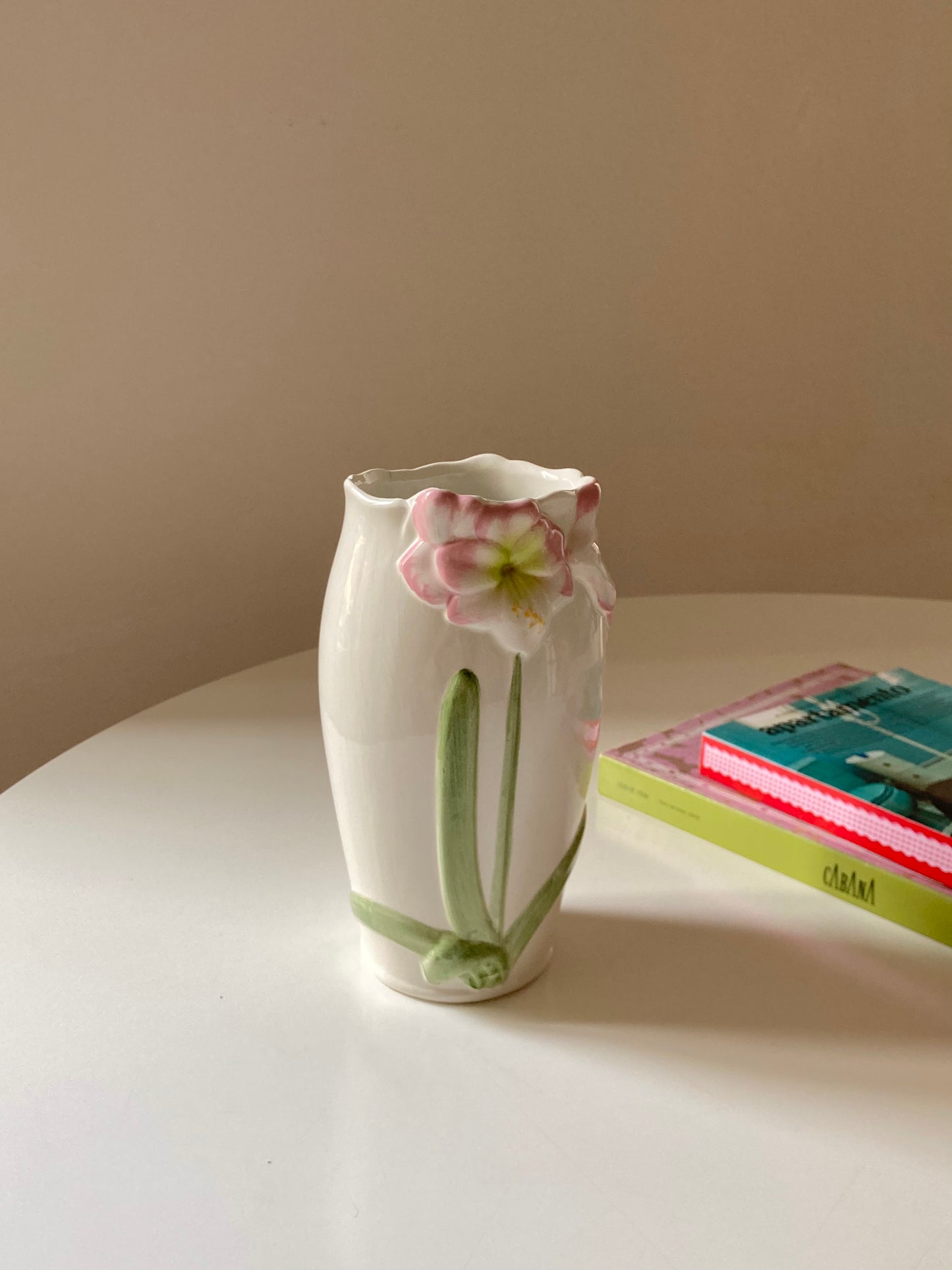 Ceramic vase with pink flowers