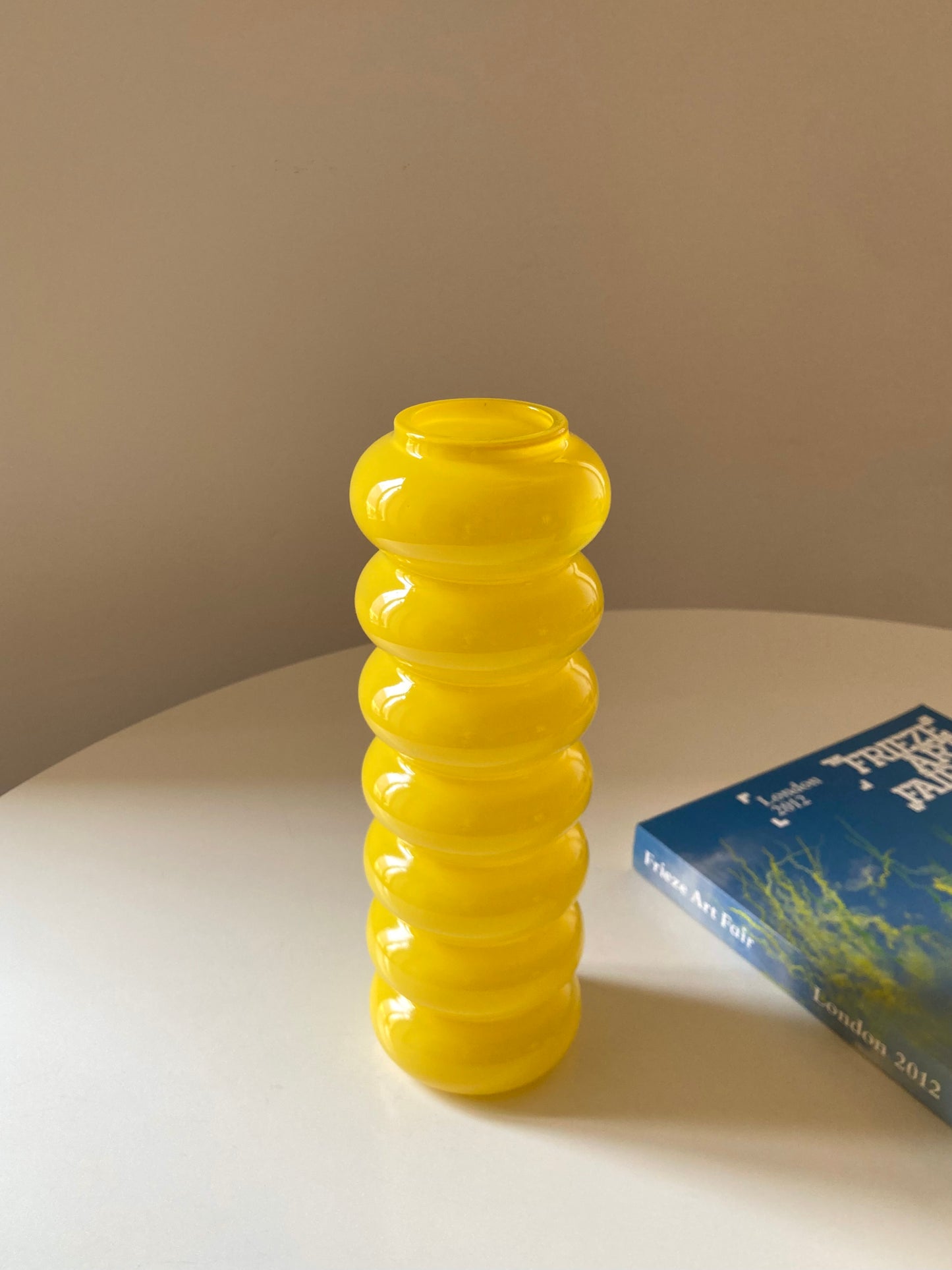 Solstrale yellow vase by Anne Nilsson