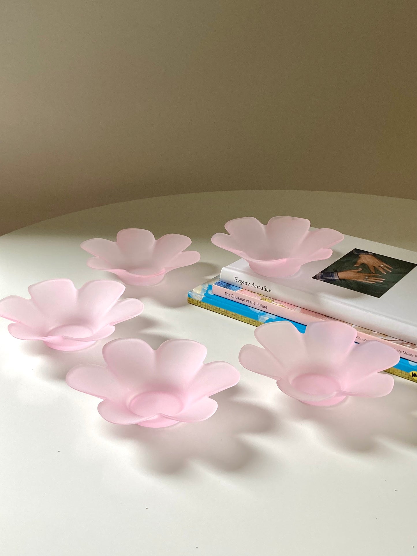 Pink glass flower-shaped bowls