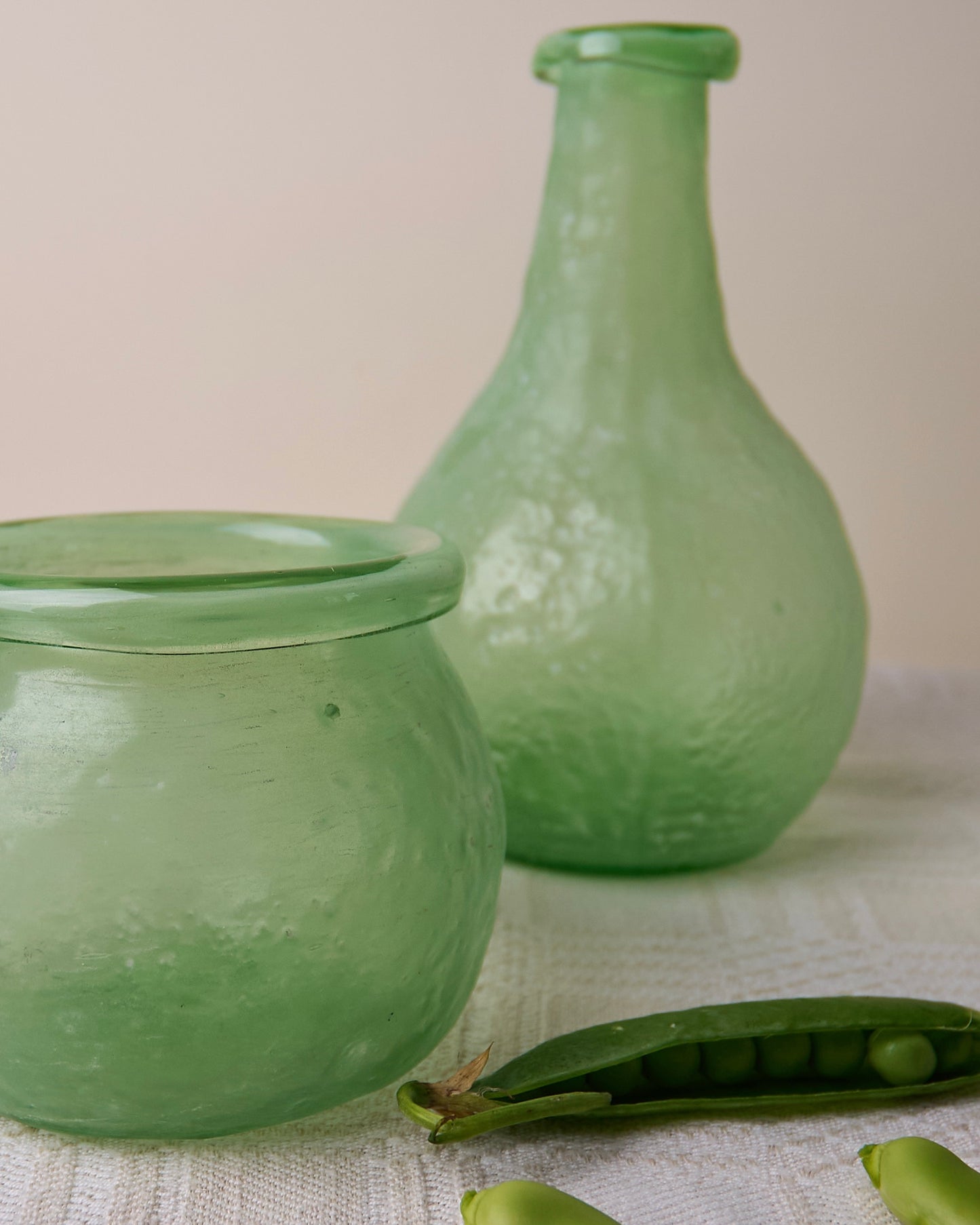 Trio asymmetric vases in green glass