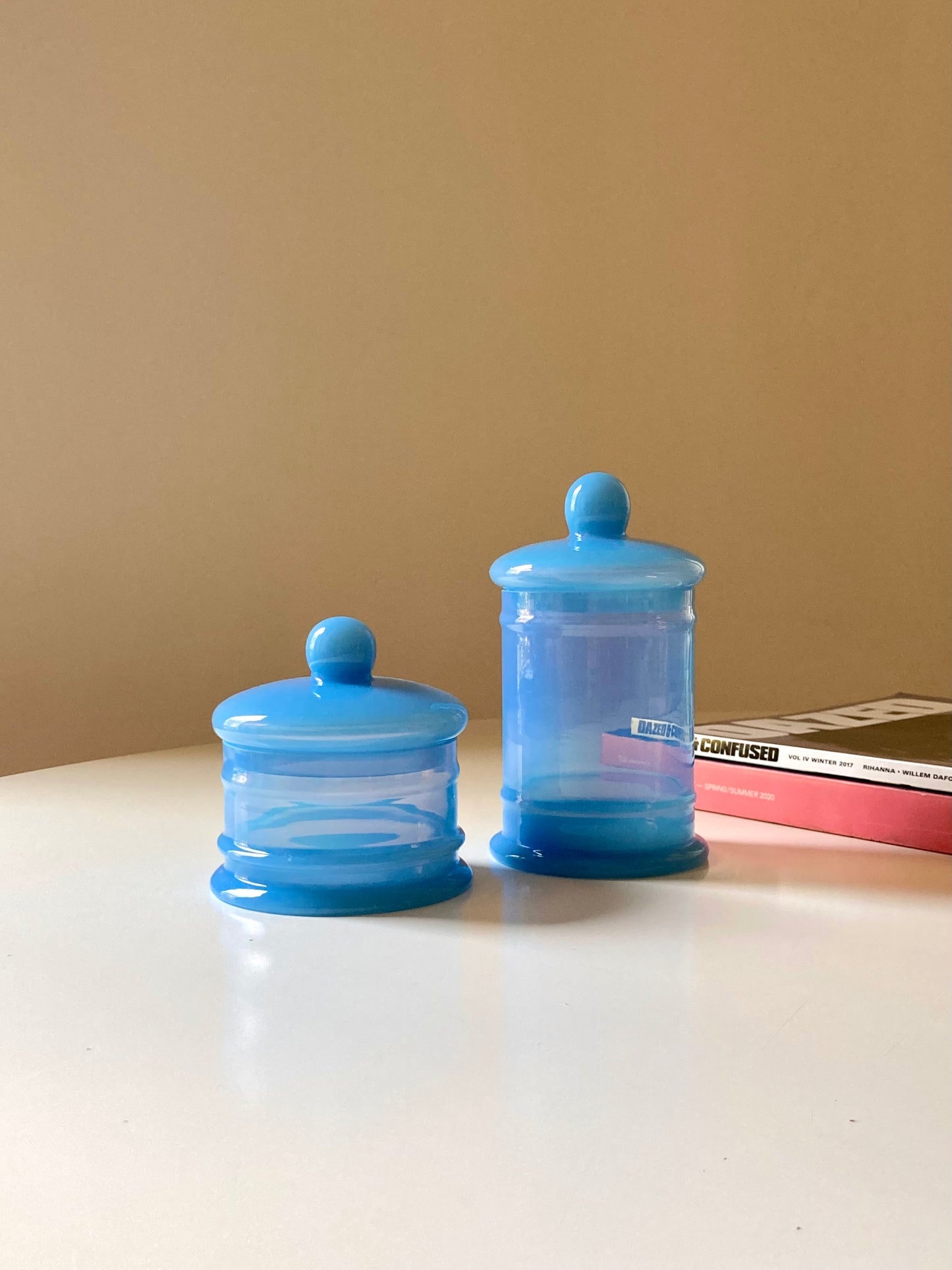 Pair of vintage light blue opaline glass jars