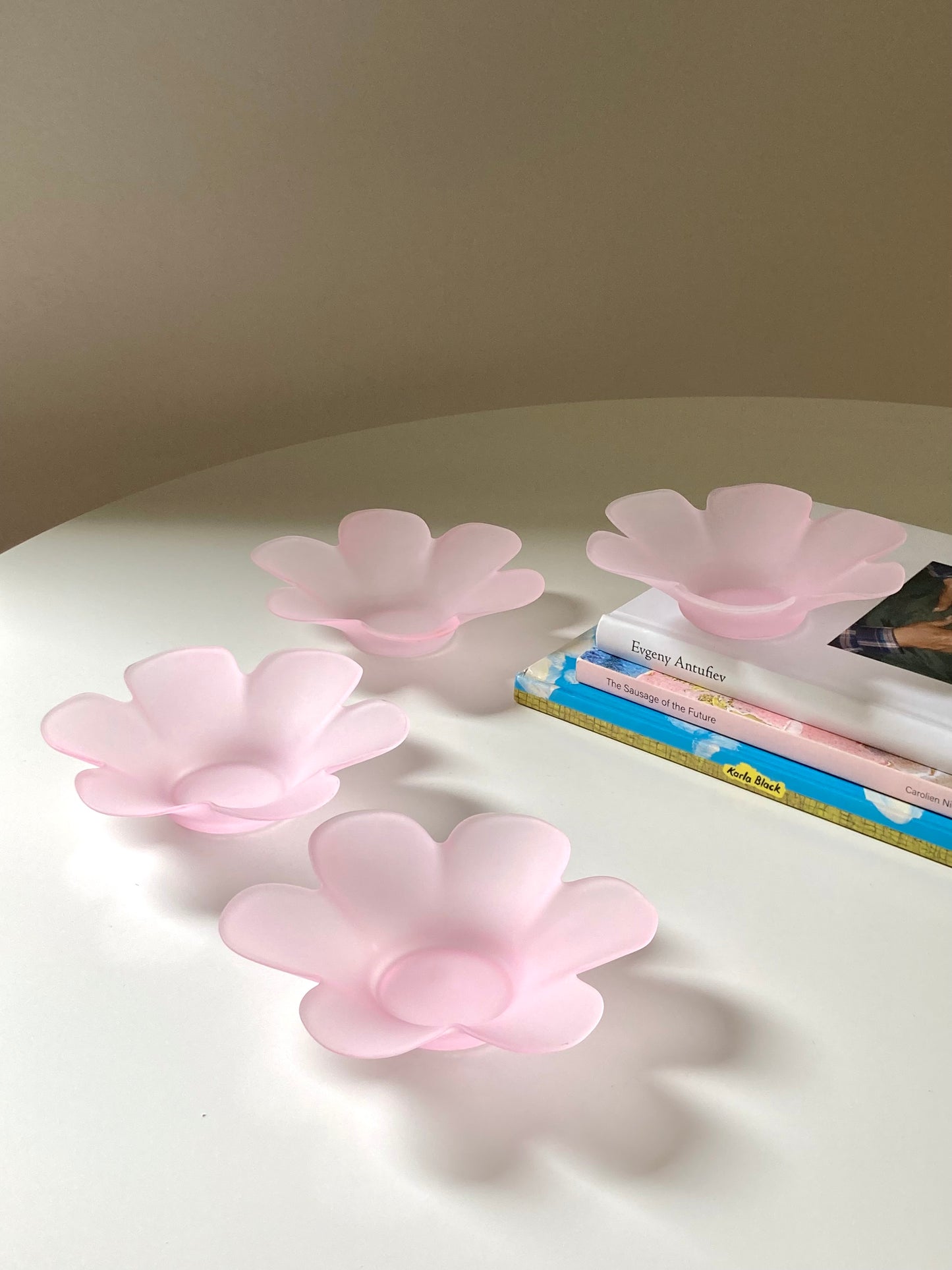 Pink glass flower-shaped bowls