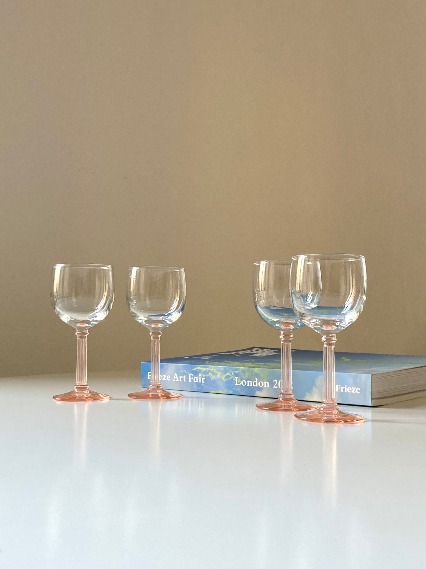 Set of pink stemmed French glasses