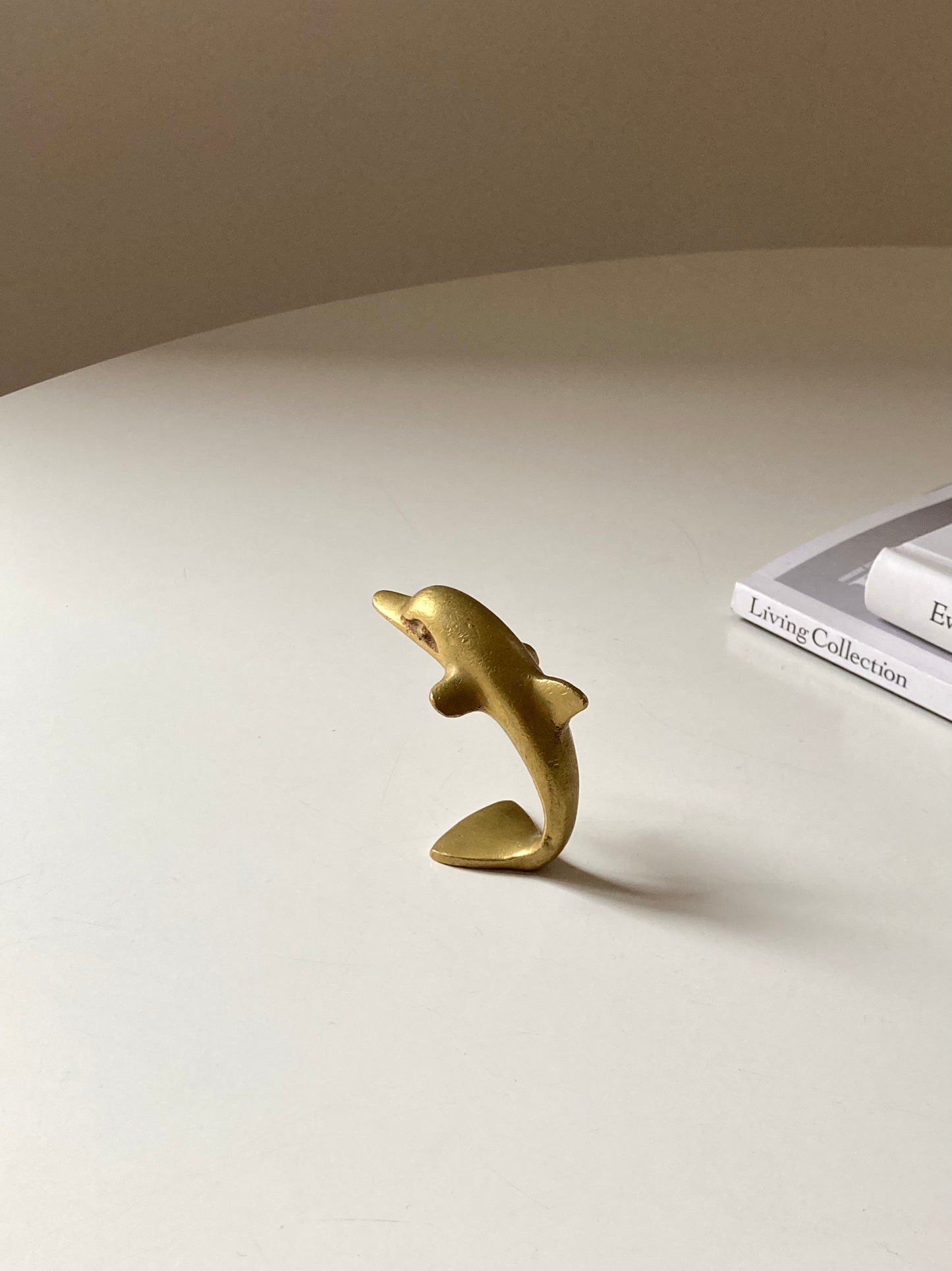 Vintage brass dolphin figurine