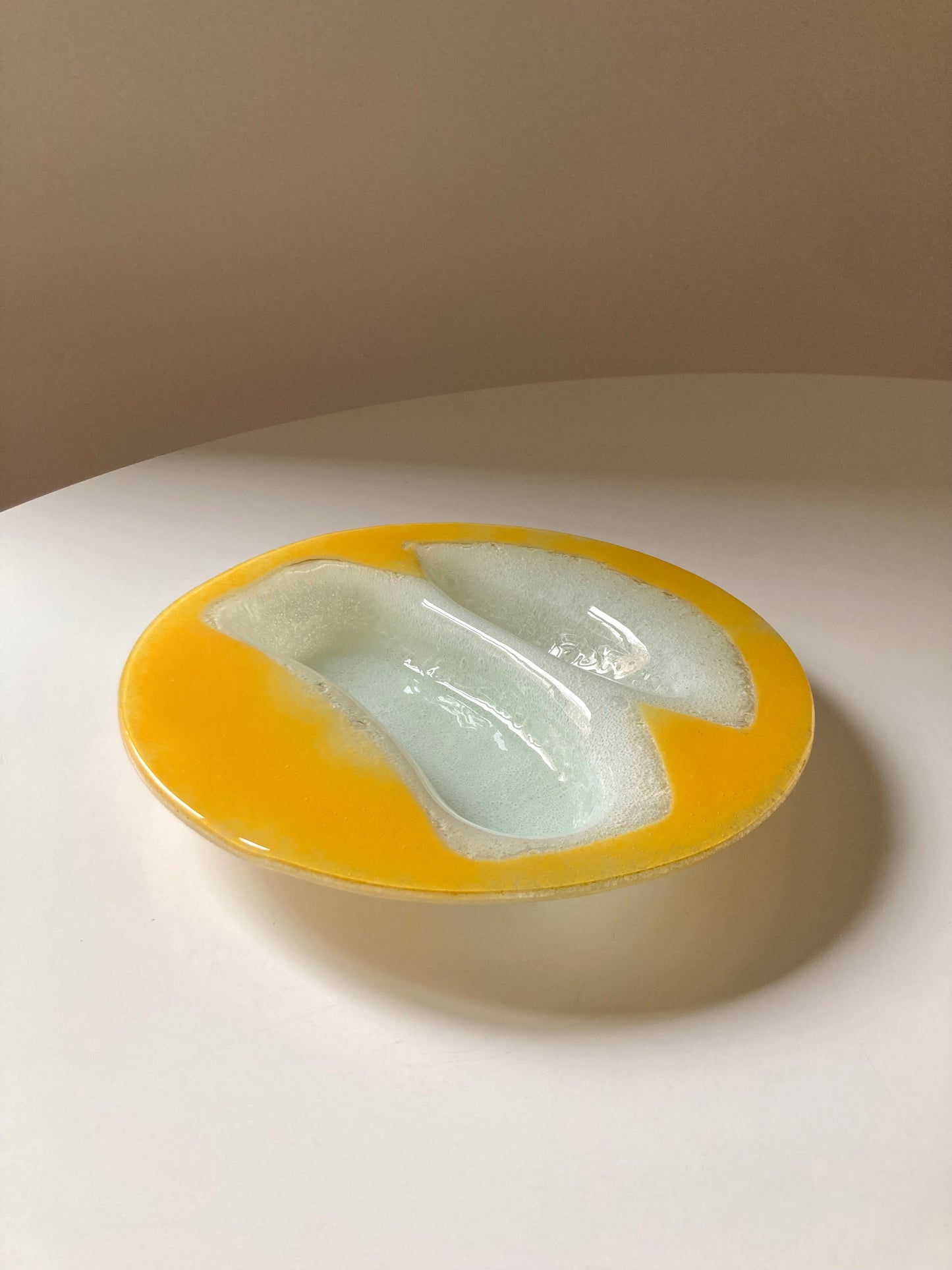 Yellow and white glass plate