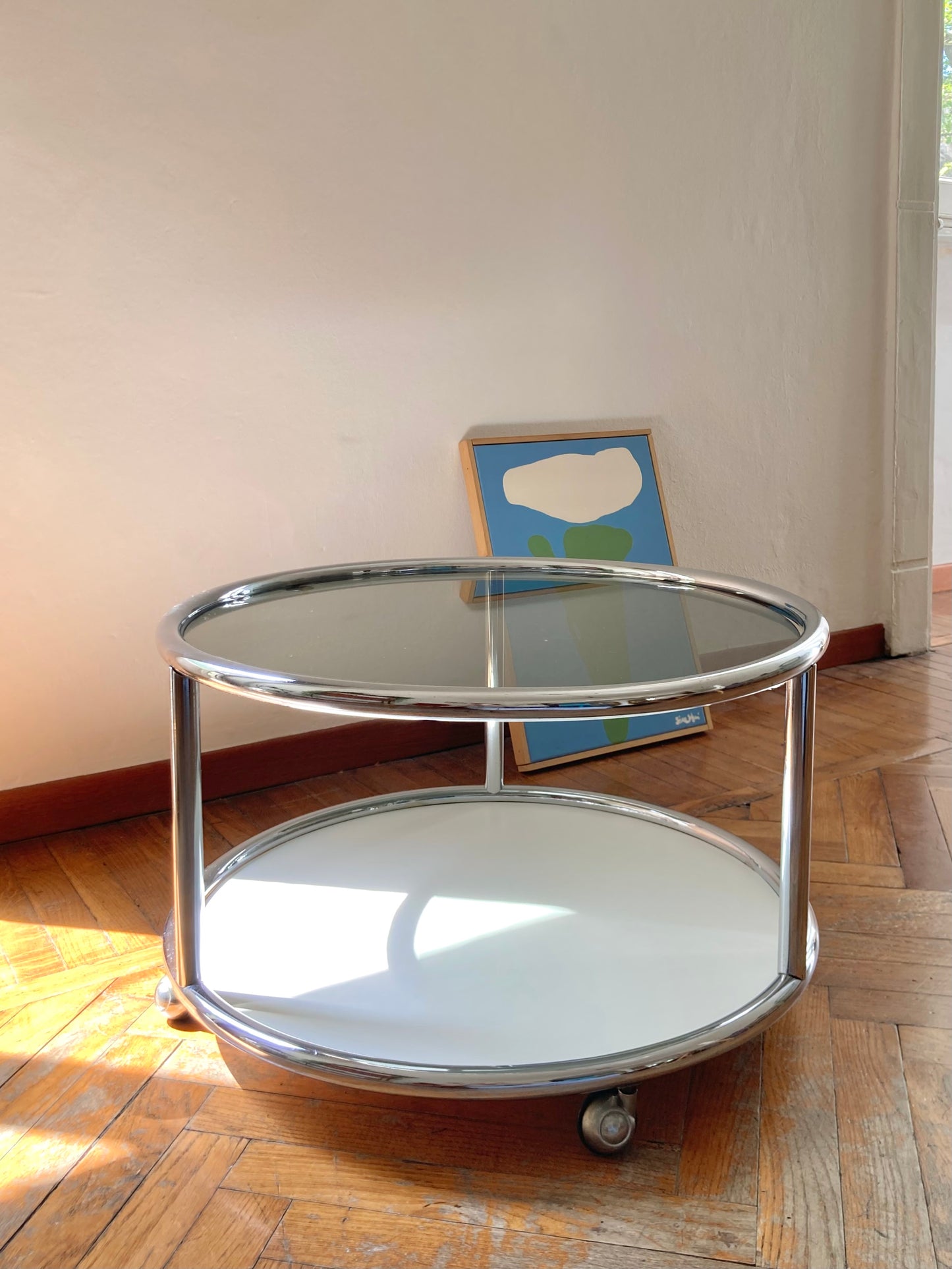 Vintage round coffee table with chrome profiles