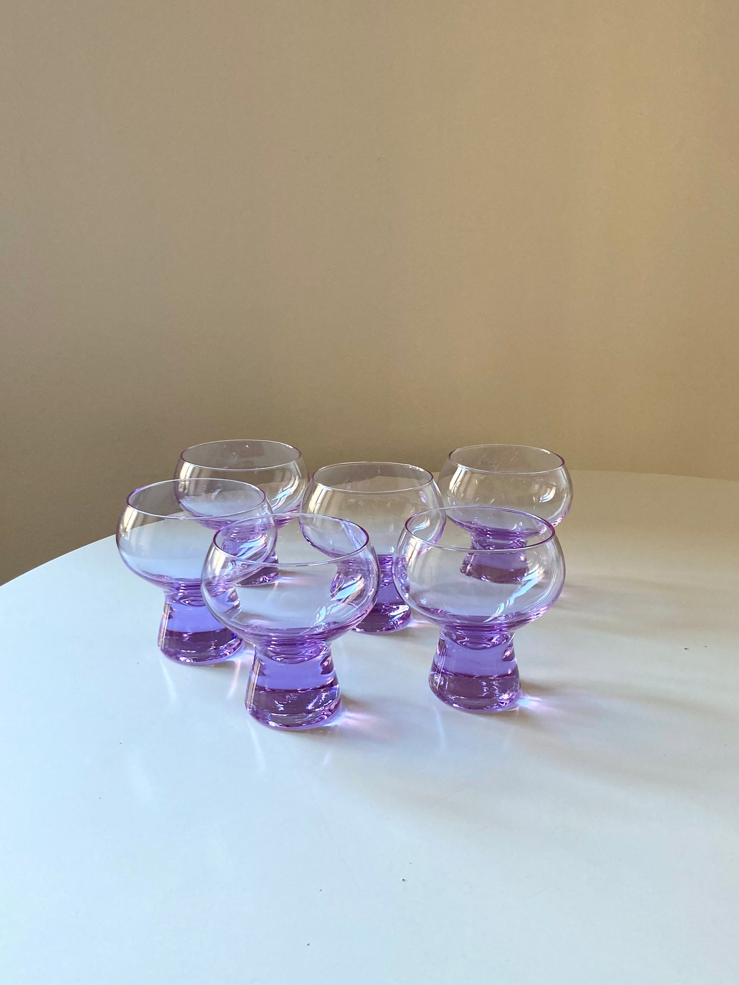 Service of 6 cups and large bowl in purple glass