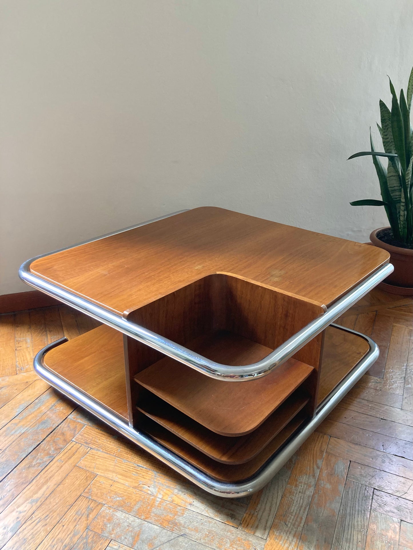 Square wooden coffee table with chromed profile