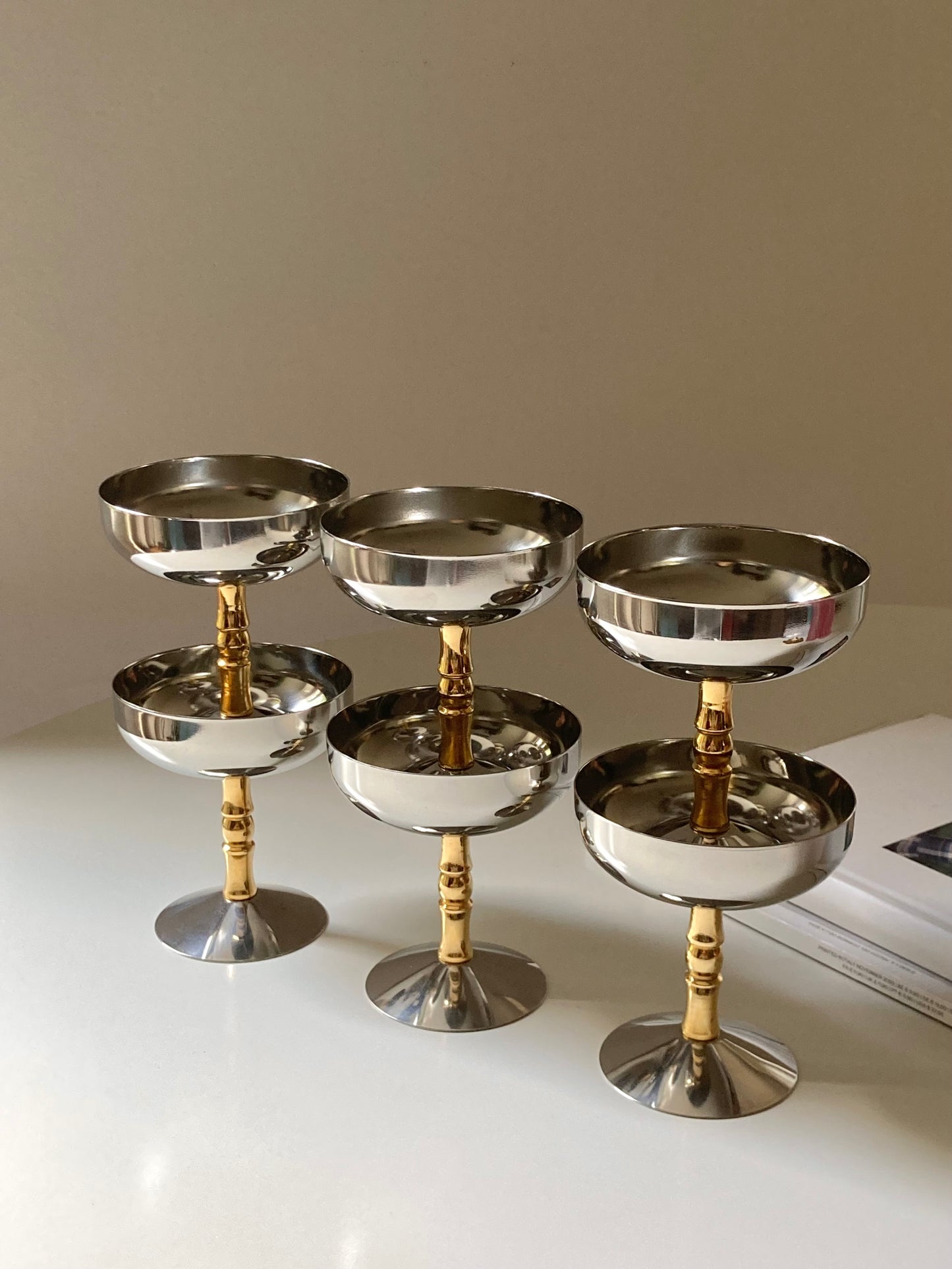 Set of 6 steel cups with golden stem