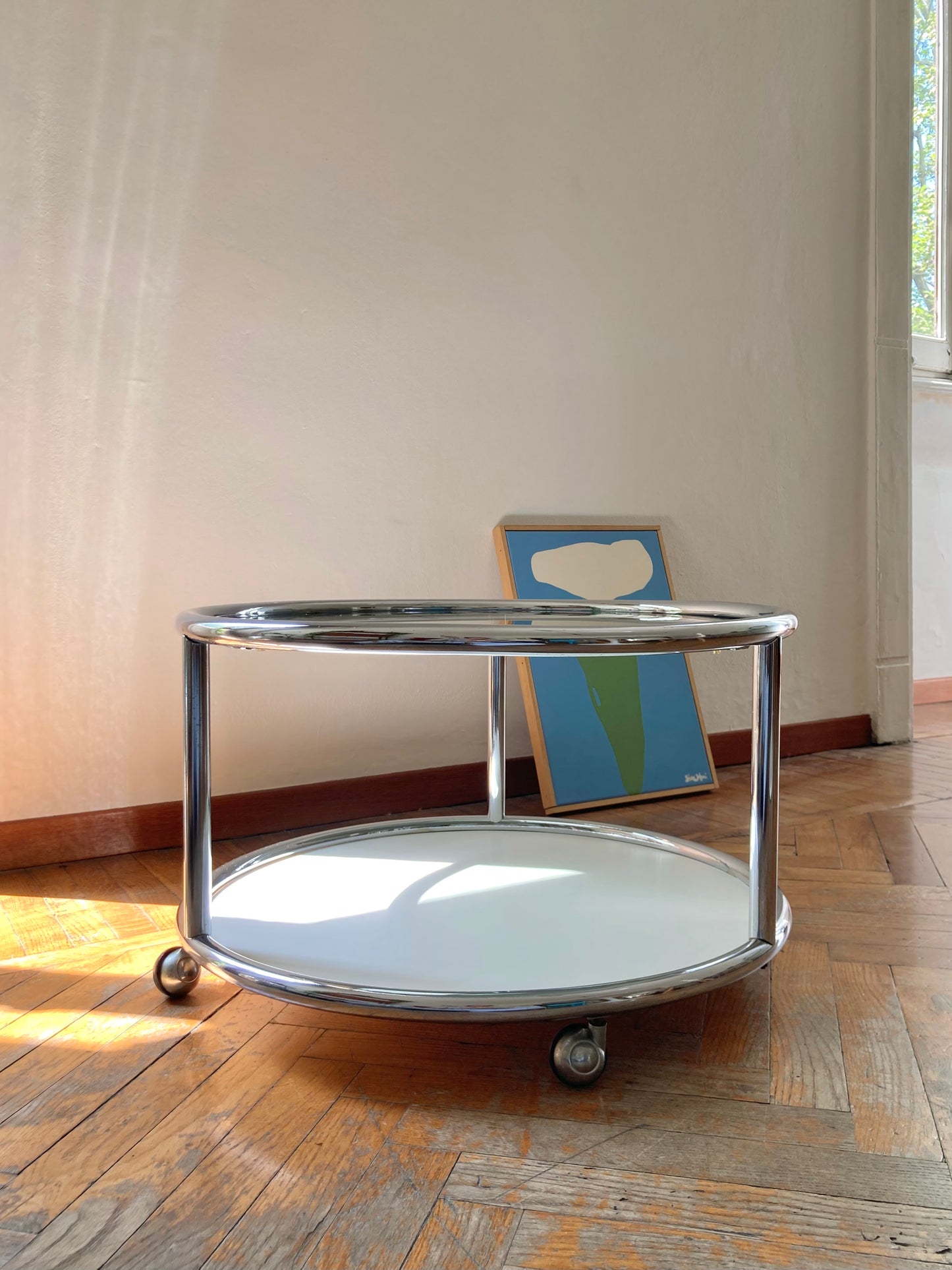 Vintage round coffee table with chrome profiles