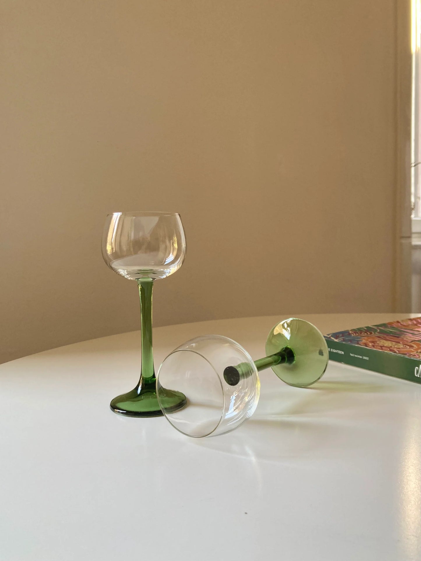 Pair of green tall stem glasses