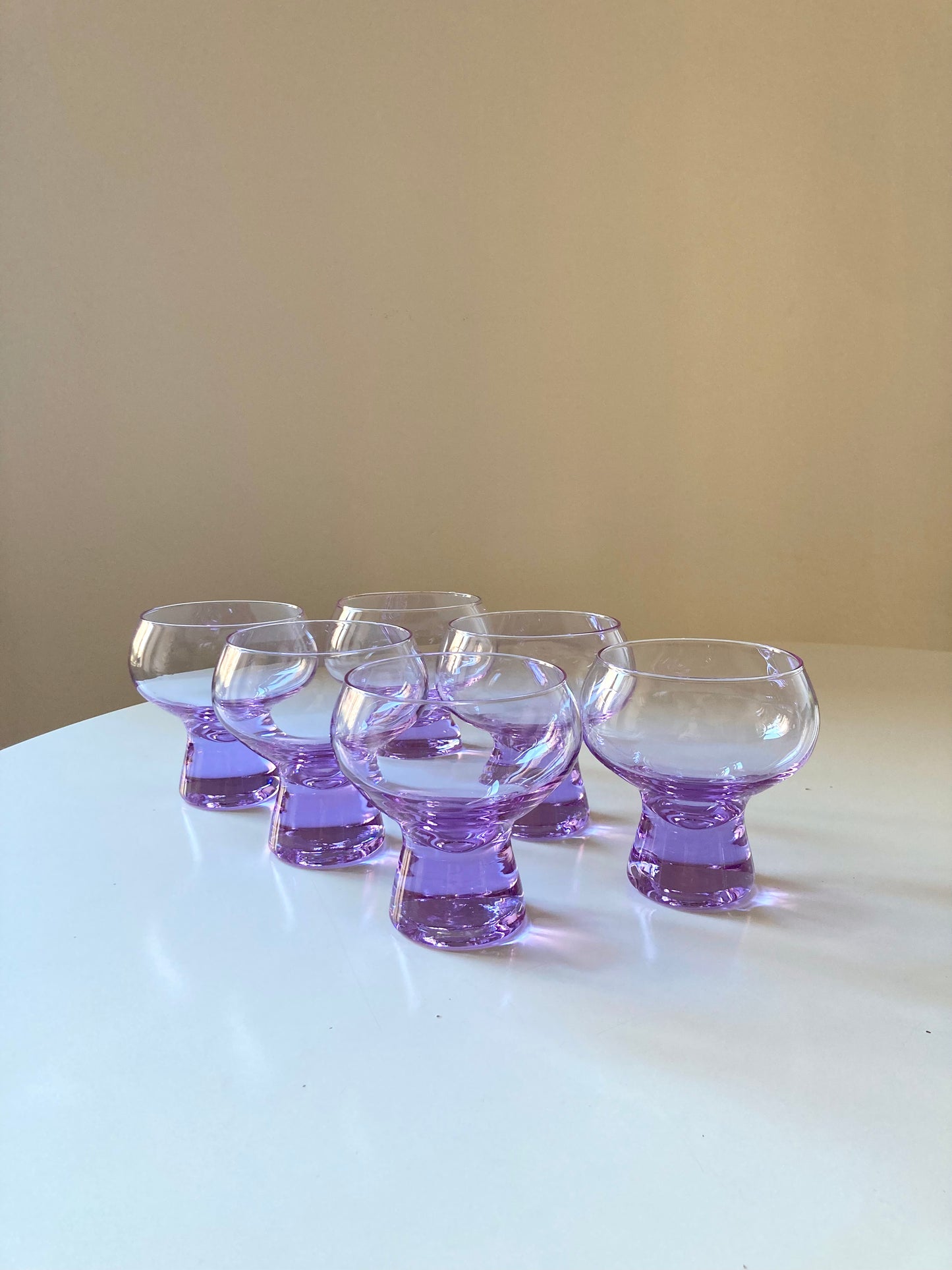 Service of 6 cups and large bowl in purple glass