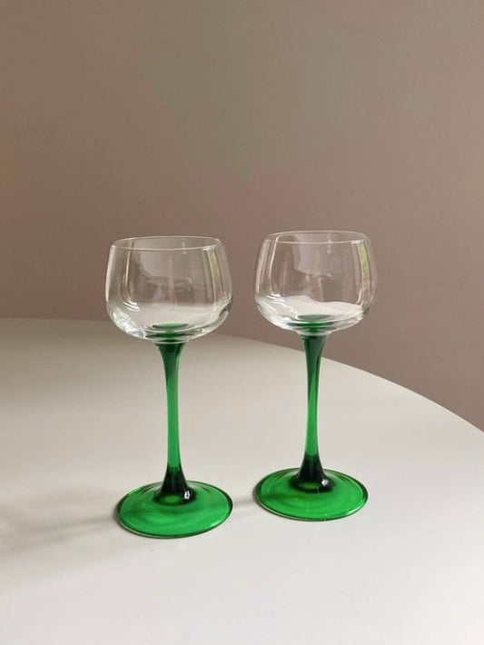 Pair of Luminarc glasses with green stem